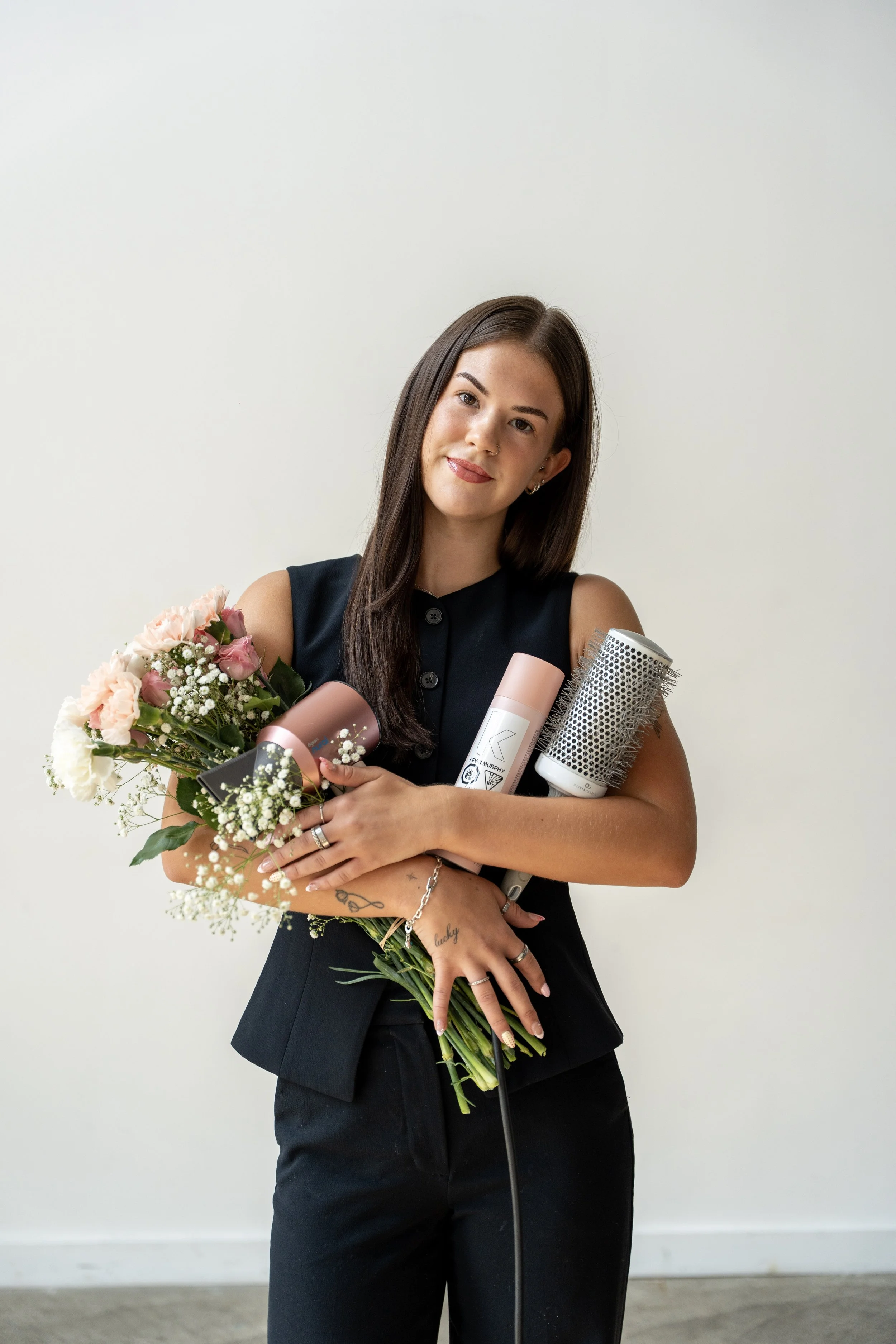 Brooklyn Comeau, Manager & Stylist at Pink Lemonade Salon in Langford, BC, specializing in lived-in colour, blonding and dimensional brunettes.