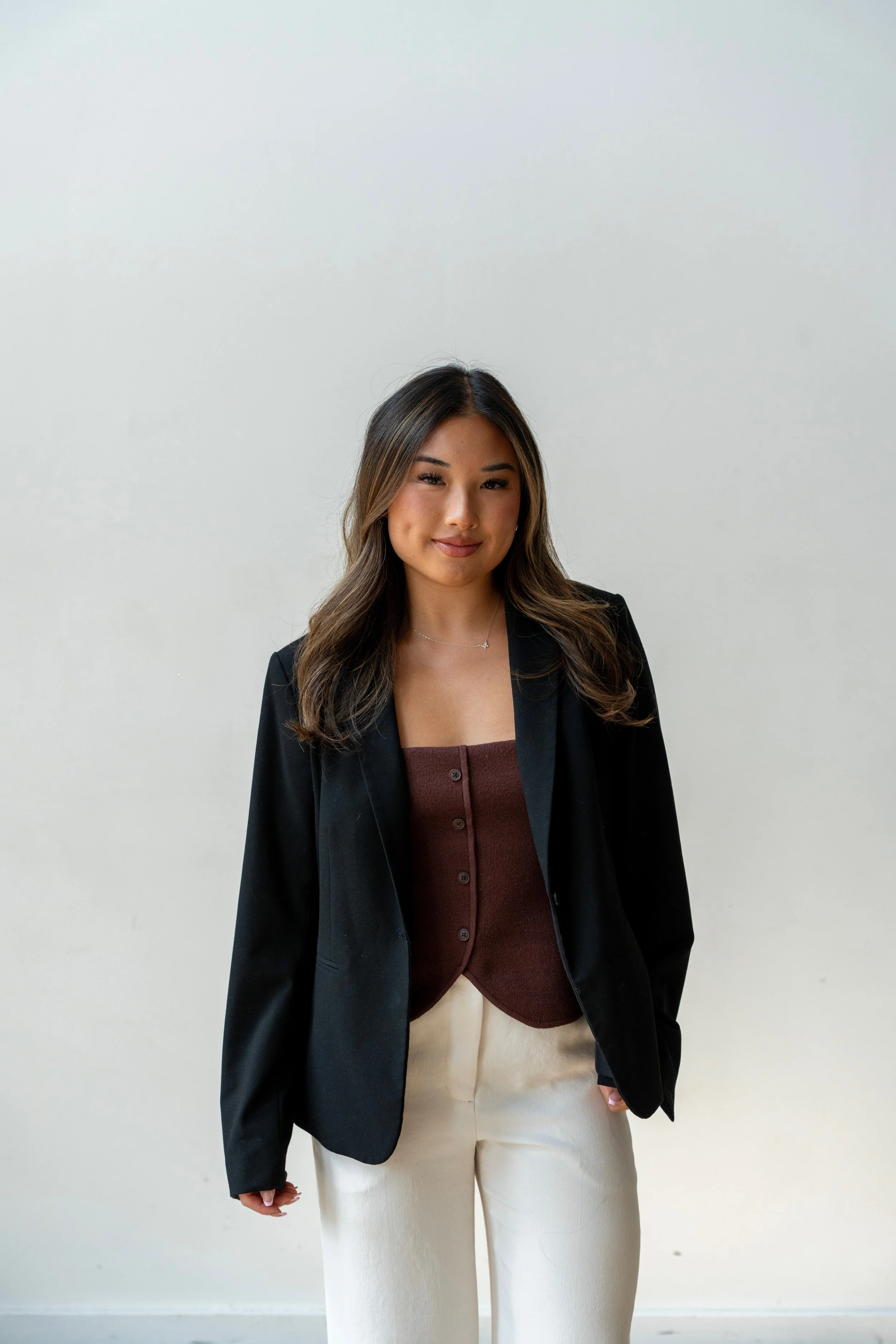 Laura Nguyen, hairstylist and extension specialist at Pink Lemonade Salon in Langford, BC, specializing in hair extensions and dimensional colour.