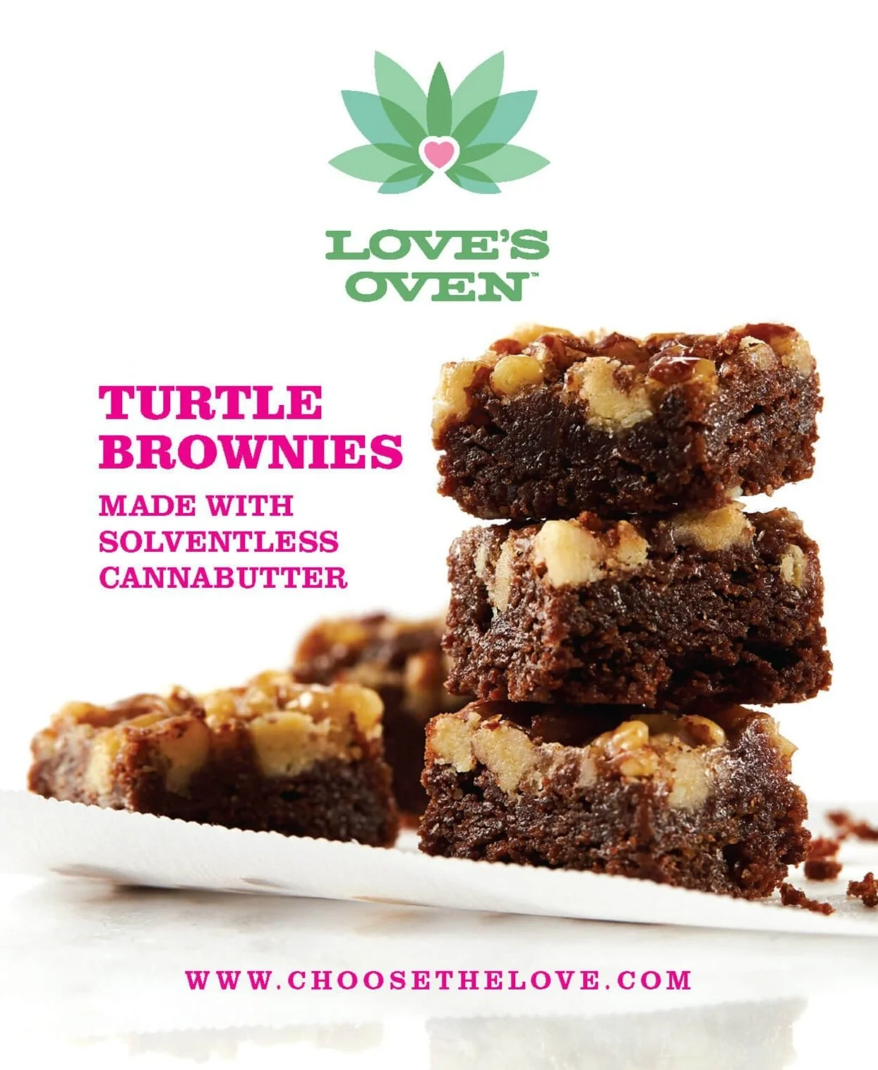 Stack of three chocolate turtle brownies with white chocolate chunks, with a fourth brownie in the foreground, on a white surface against a white background. The image features the Love's Oven logo with a green leaf and pink heart at the top, pink an