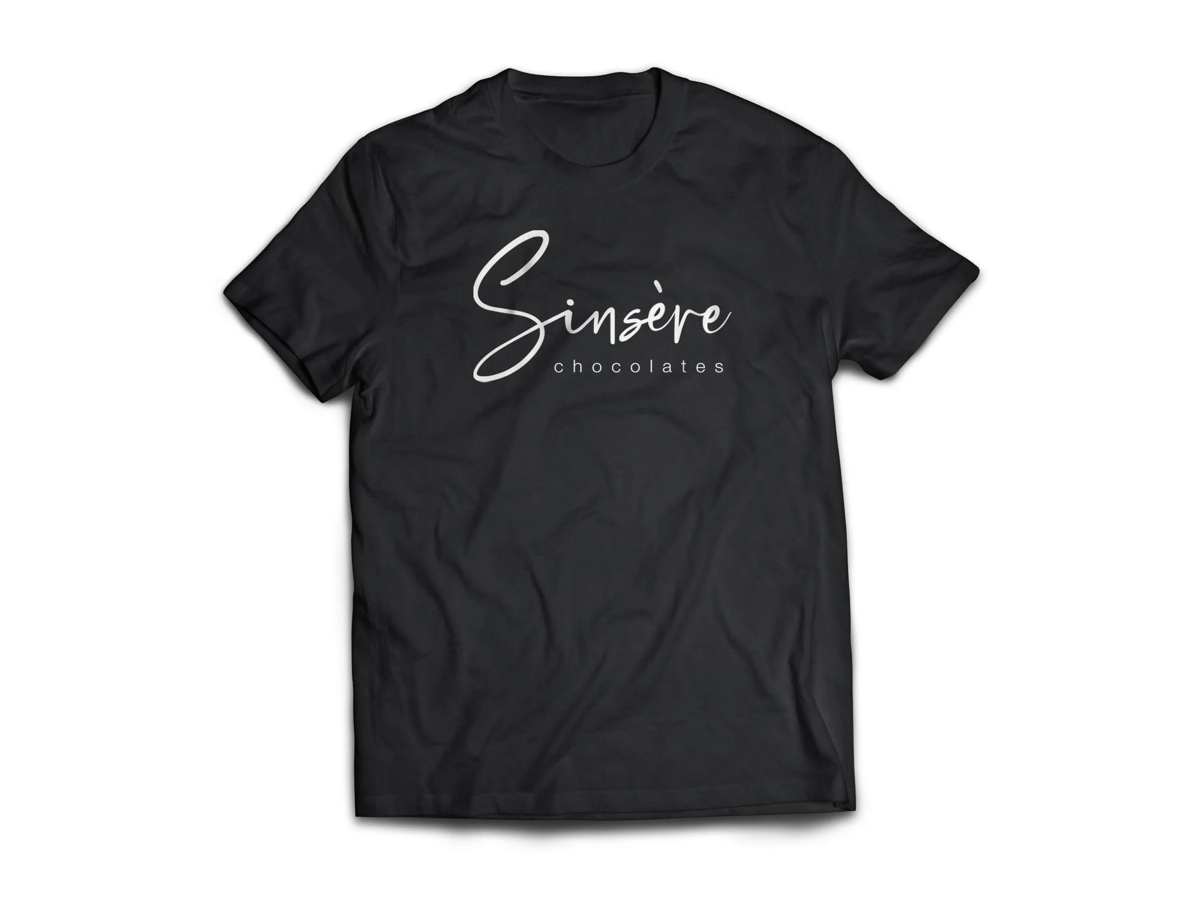 Black T-shirt with the words 'Sinśere chocolates' written on the front in white cursive font.