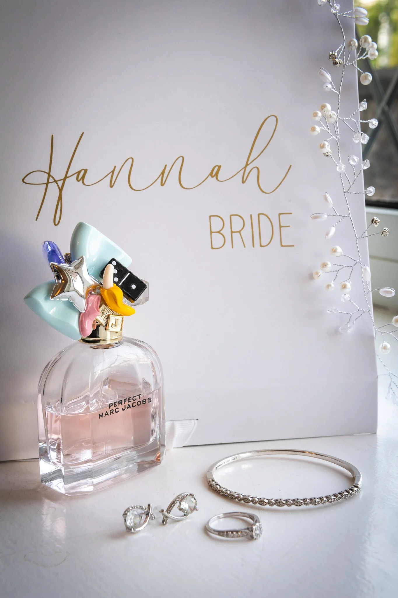 brides jewelery and perfume photographed by UK wedding photographer chris peach photography