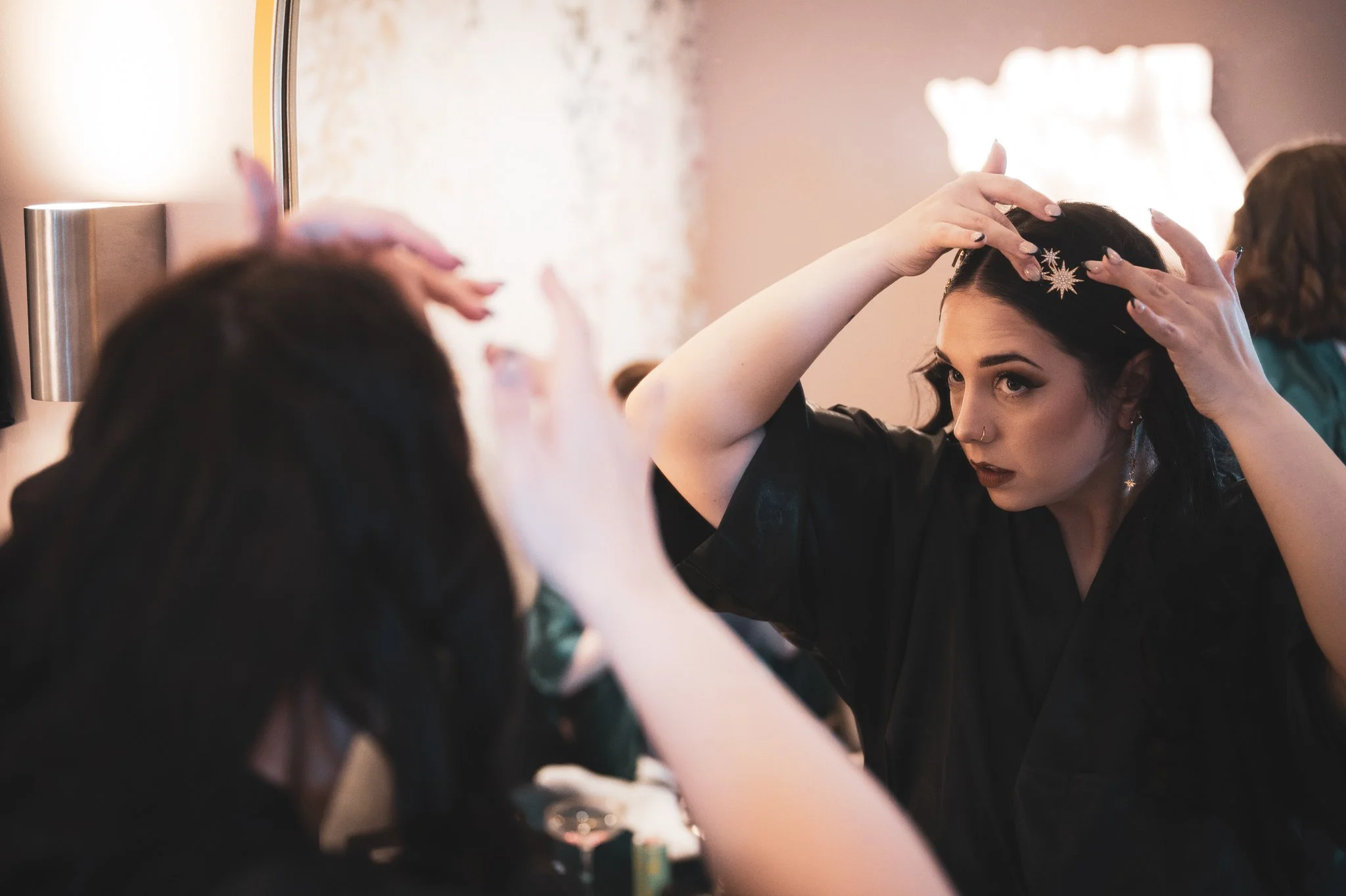 bride having her hair and makeup done at the boathouse wedding venue. at aston marina near stone staffordshire photographed by UK wedding photographer chris peach photography