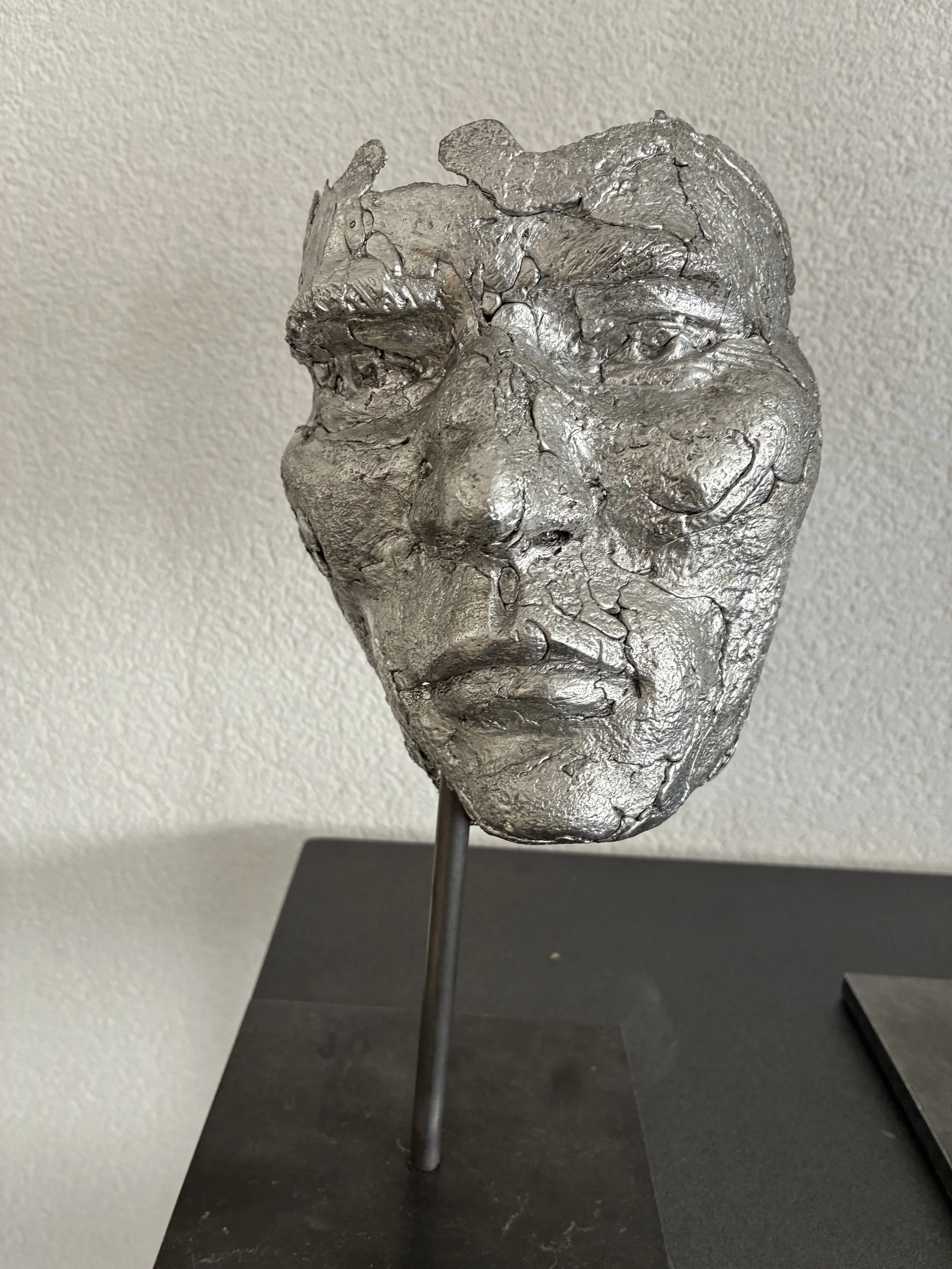 Visage homme en étain