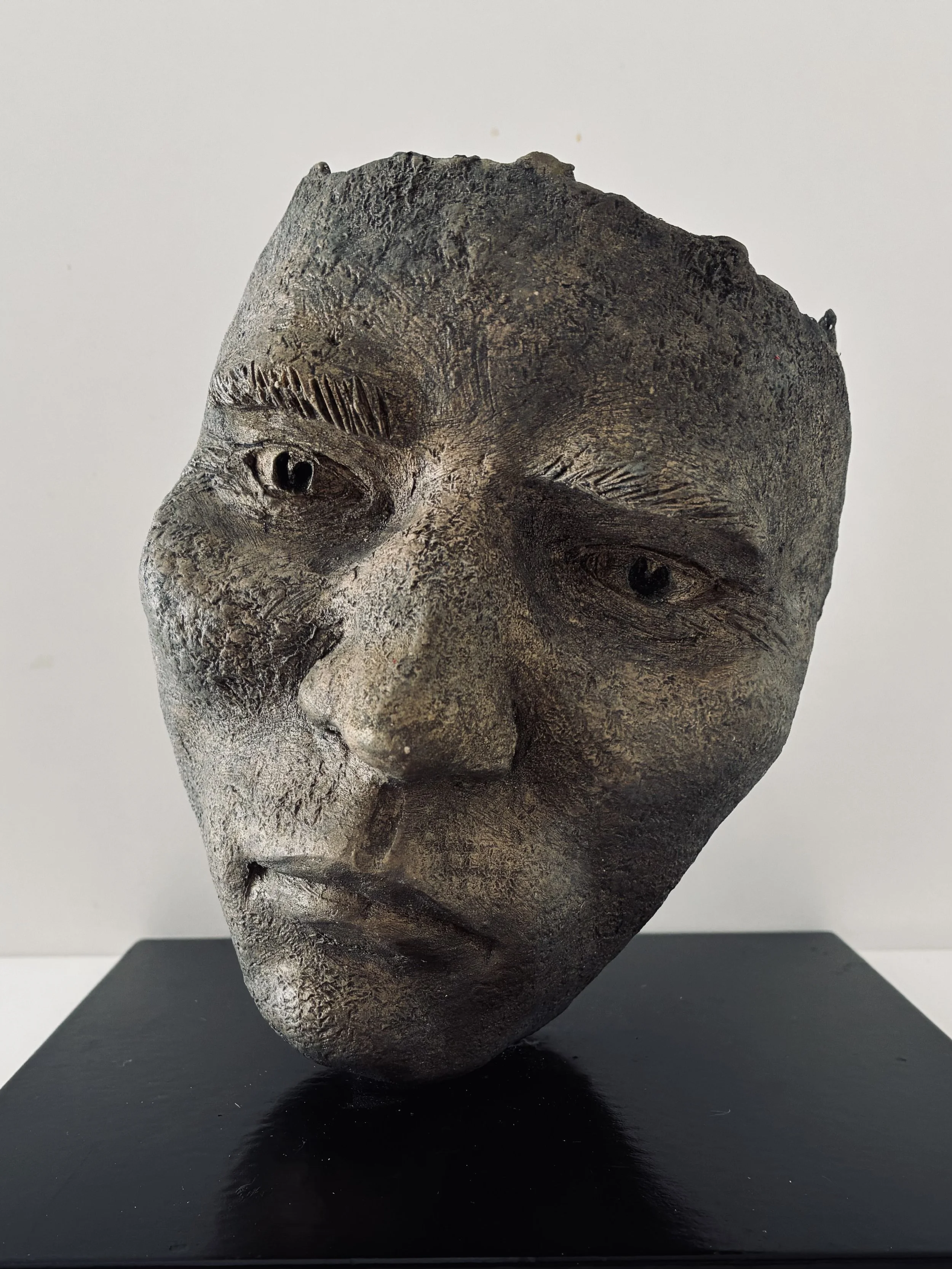 Visage homme grès