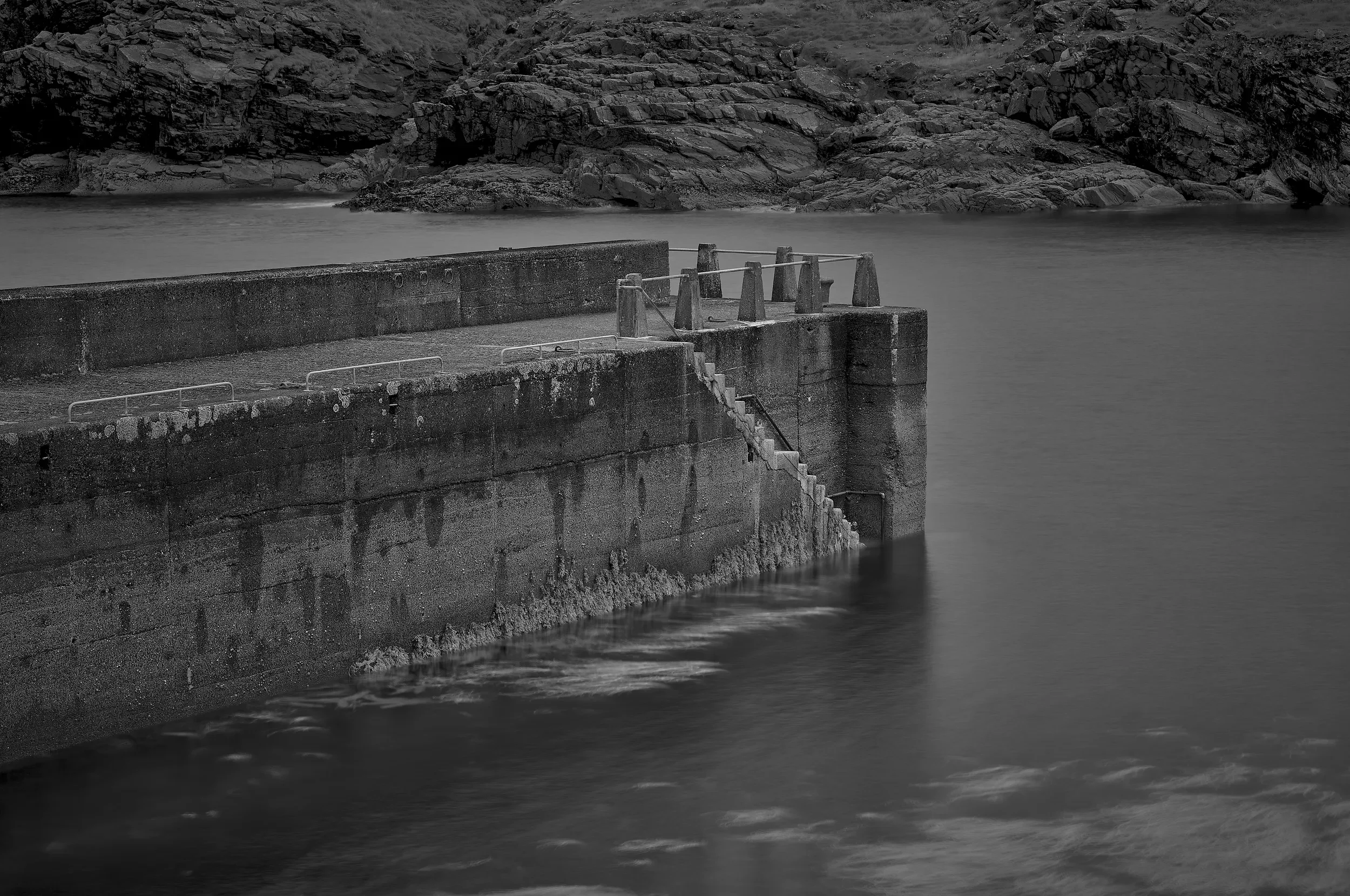   The Harbour Wall   / The solitary stairway breaking the pier's strong geometric lines / Ring of Kerry, 2025   IRP-003
