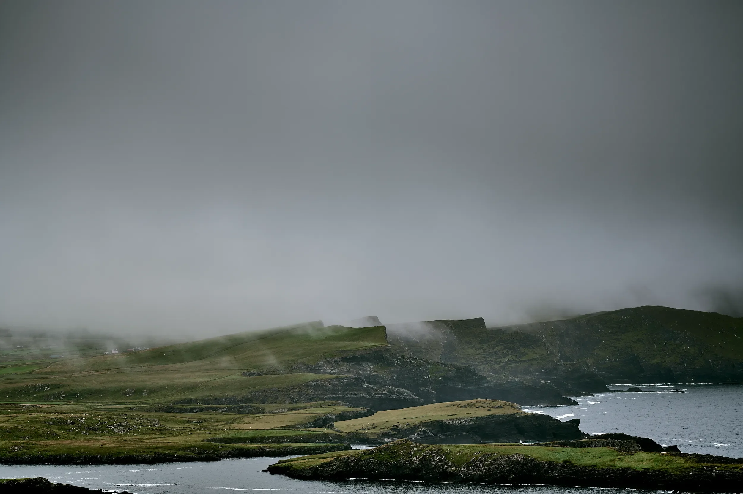   Veiled in Mist   / Reencaheragh's ancient coastal fortifications beneath low clouds, Portmagee / Skellig Ring, 2026   KYI-036
