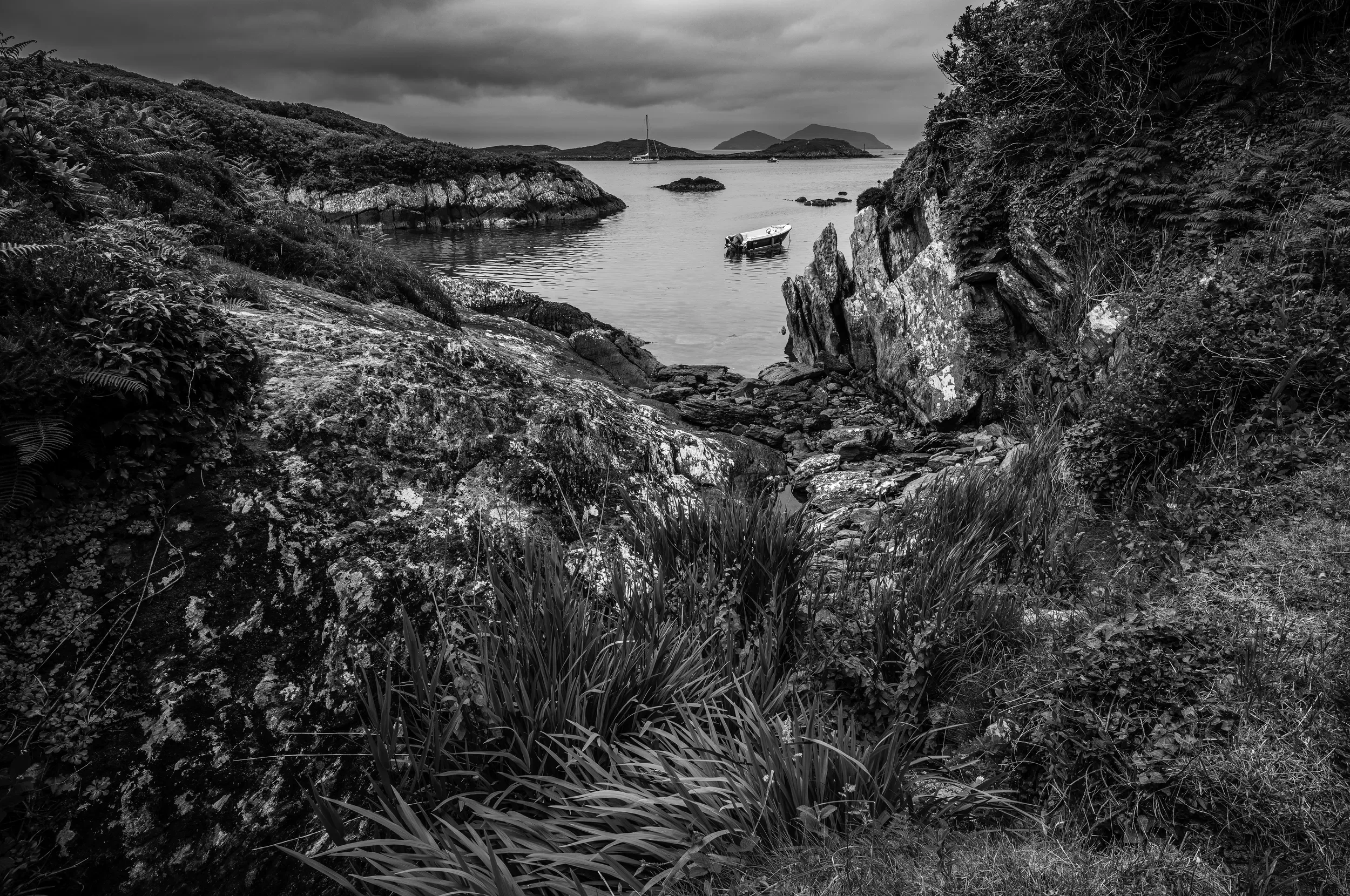   Beyond the Rocks   / Natural framing and rich textures opening onto a distant horizon / Ring of Kerry, 2023   KYI-062