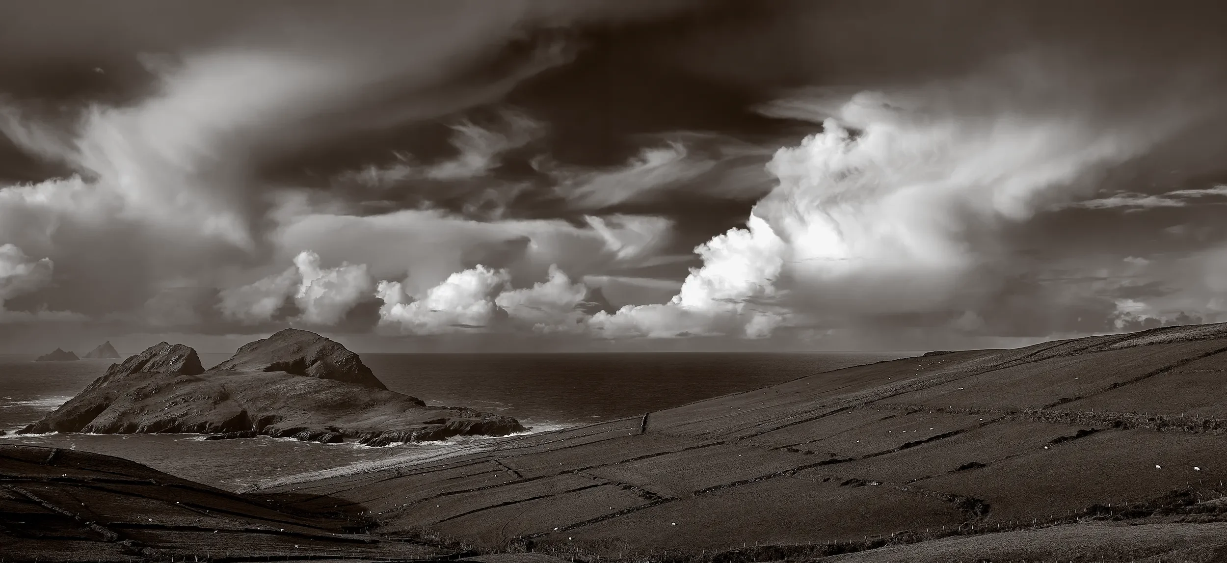   The Passing Light   / The clouds made Puffin Islands and the Skelligs appear tiny. / Region, 2025   KYI-058