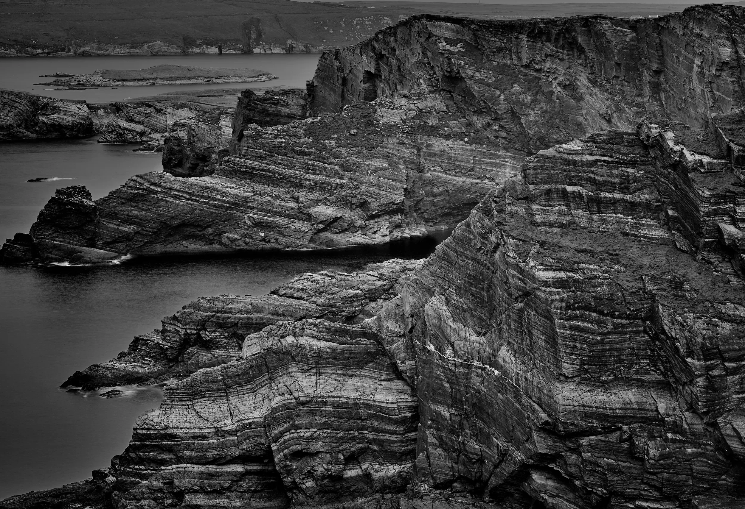  Written in Stone   / Ancient rock layers revealing geological history at Kerry Cliffs / Skellig Ring, 2025   KYI-031