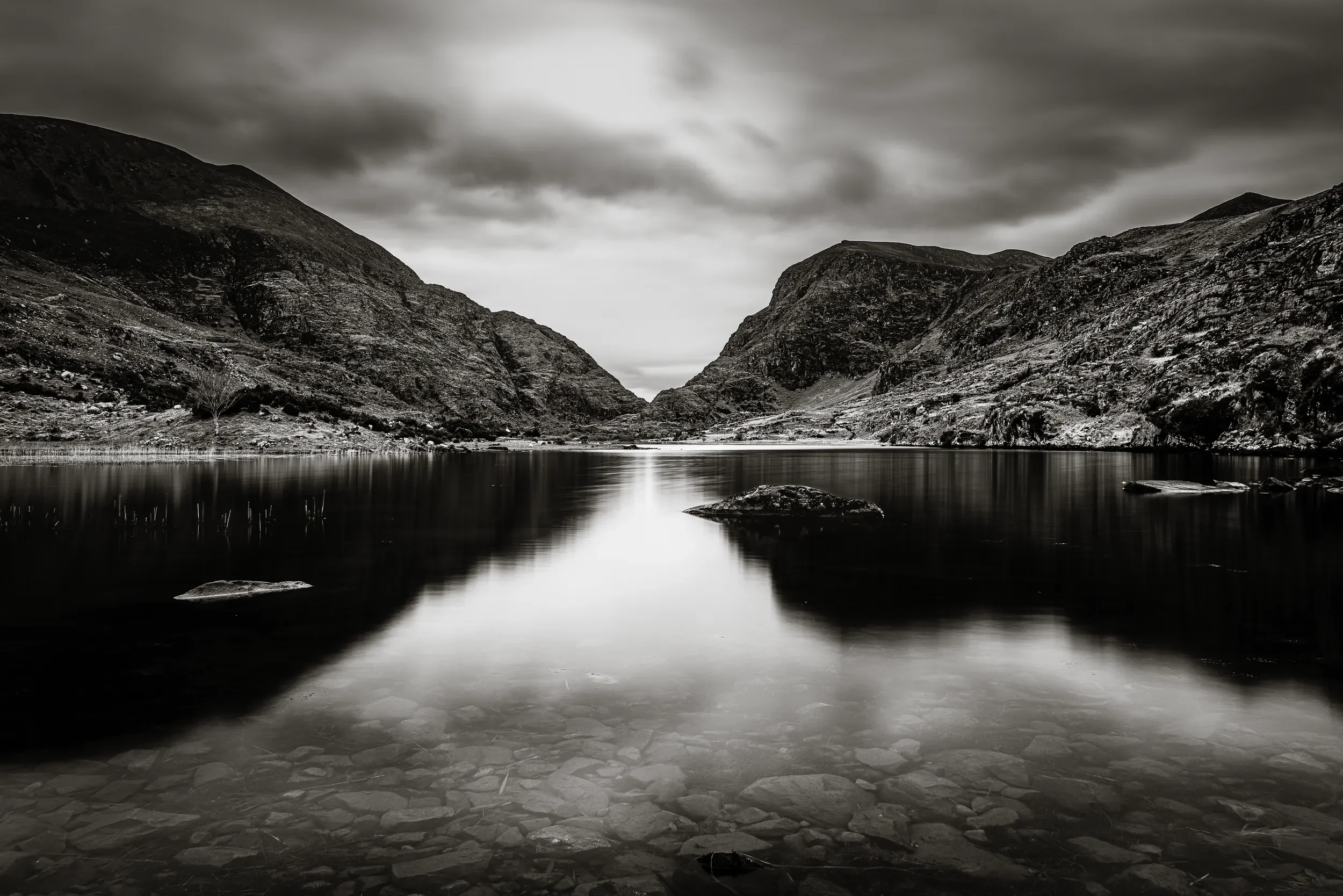   Perfect Symmetry   / Dramatic skies mirrored in the still waters of Gap of Dunloe / Killarney National Park, 2021   KYI-068