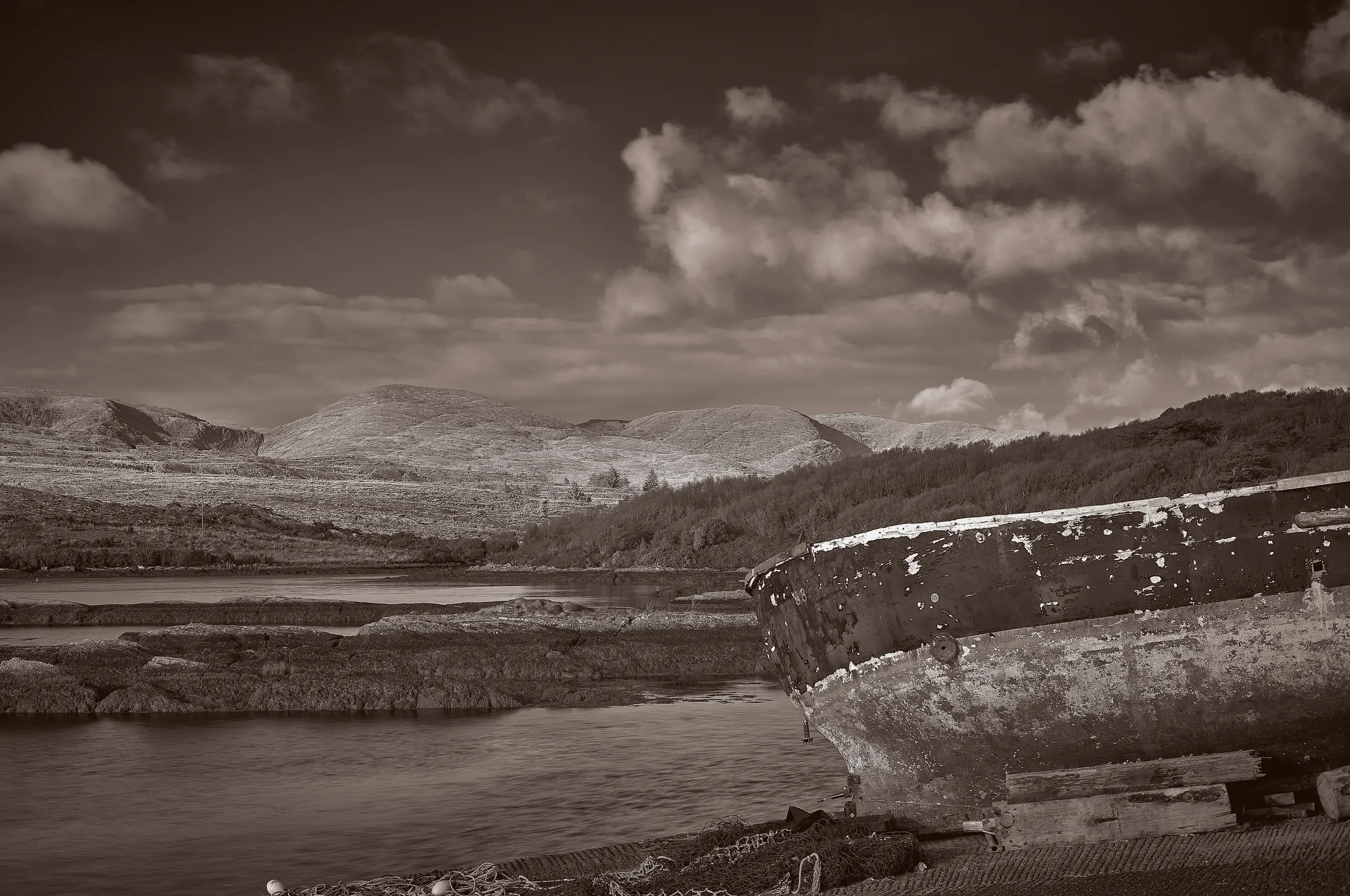   Weathered Memories   / Forgotten boat connecting past and present at Oysterbed Pier / Ring of Kerry, 2025   IRP-023