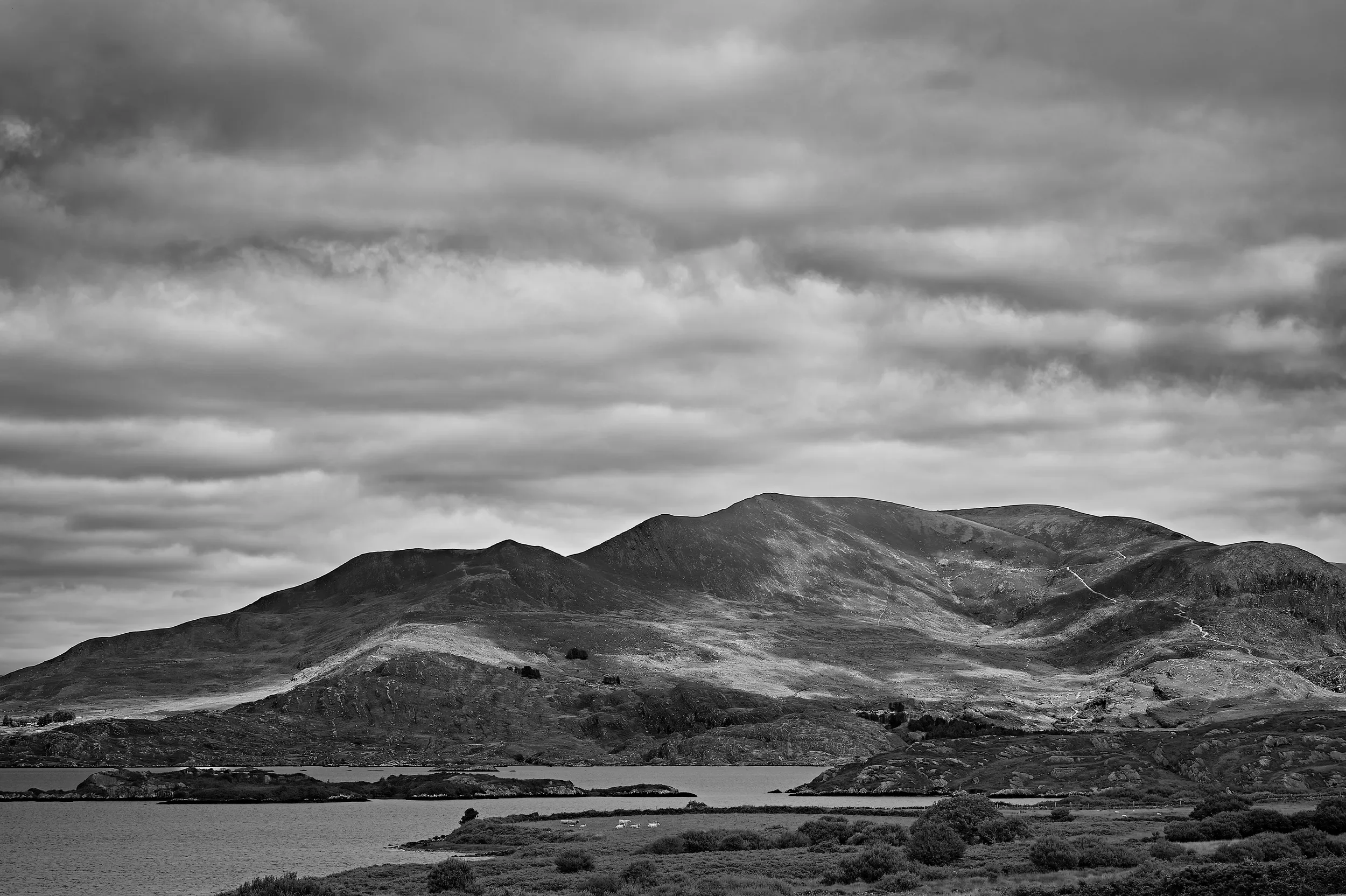   Gathering Skies   / Ever-changing skies over Lough Currane near Waterville, shaped by the Atlantic / Skellig Ring, 2026   KYI-041