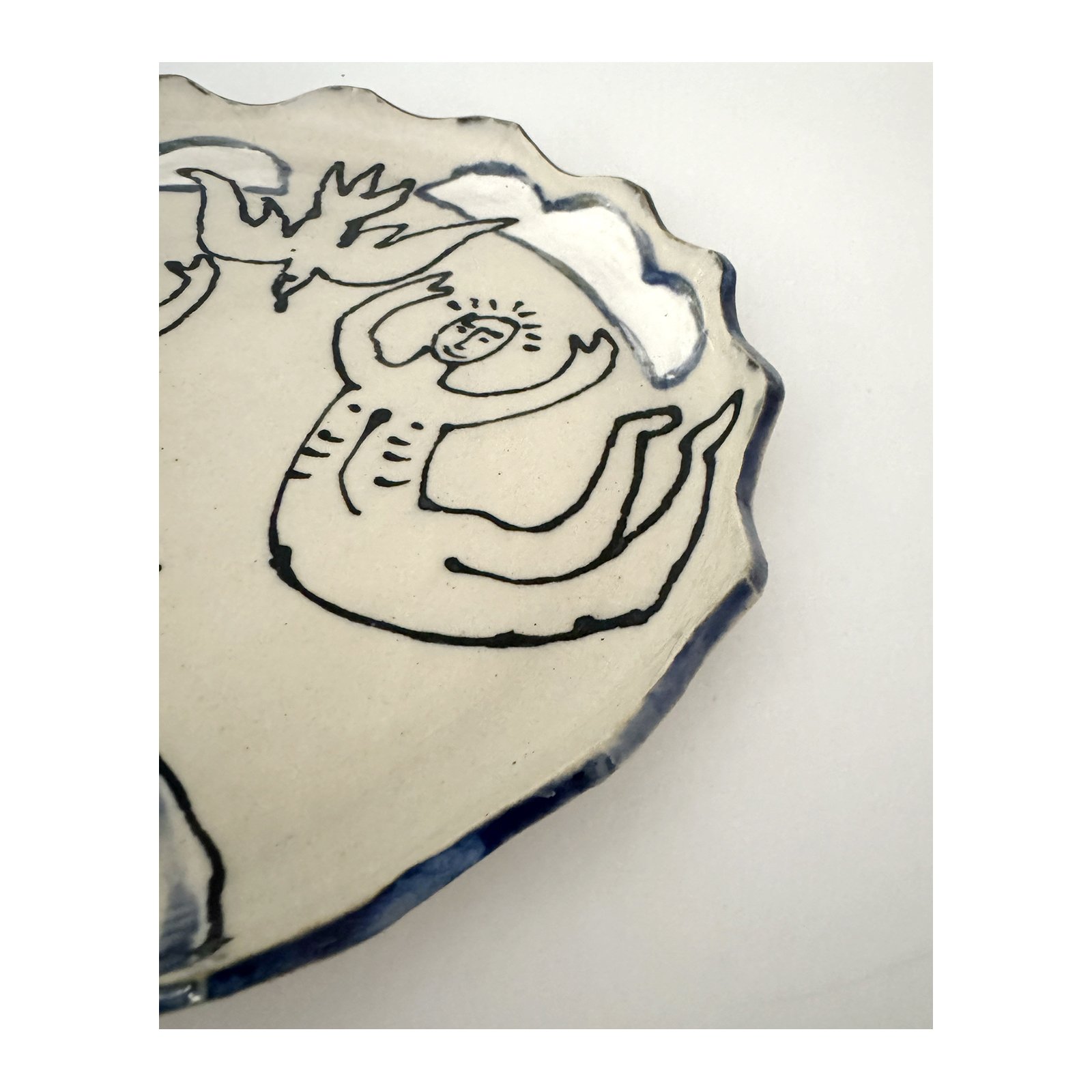 782. Ceramic plate by Sarah Odedina Jumping.jpg
