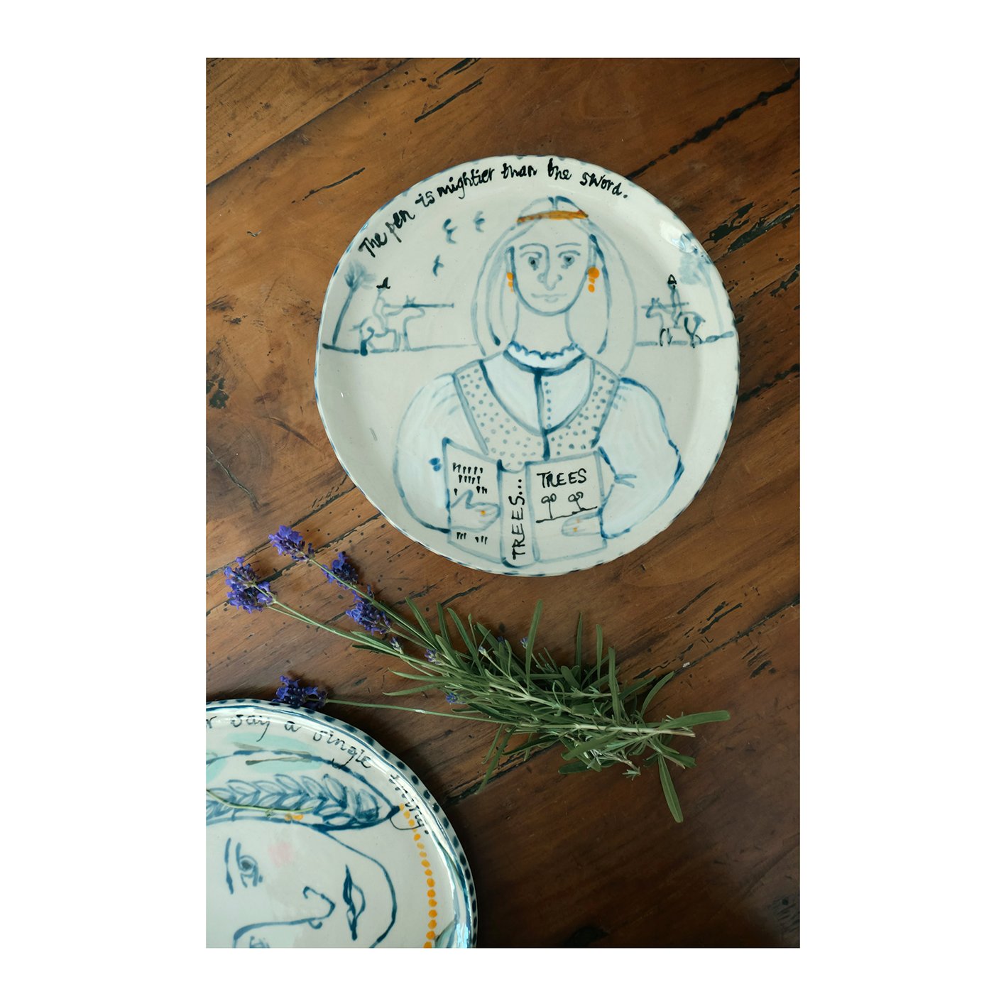 779. 2 Ceramic plate by Sarah Odedina The Pen is Mightier.jpg
