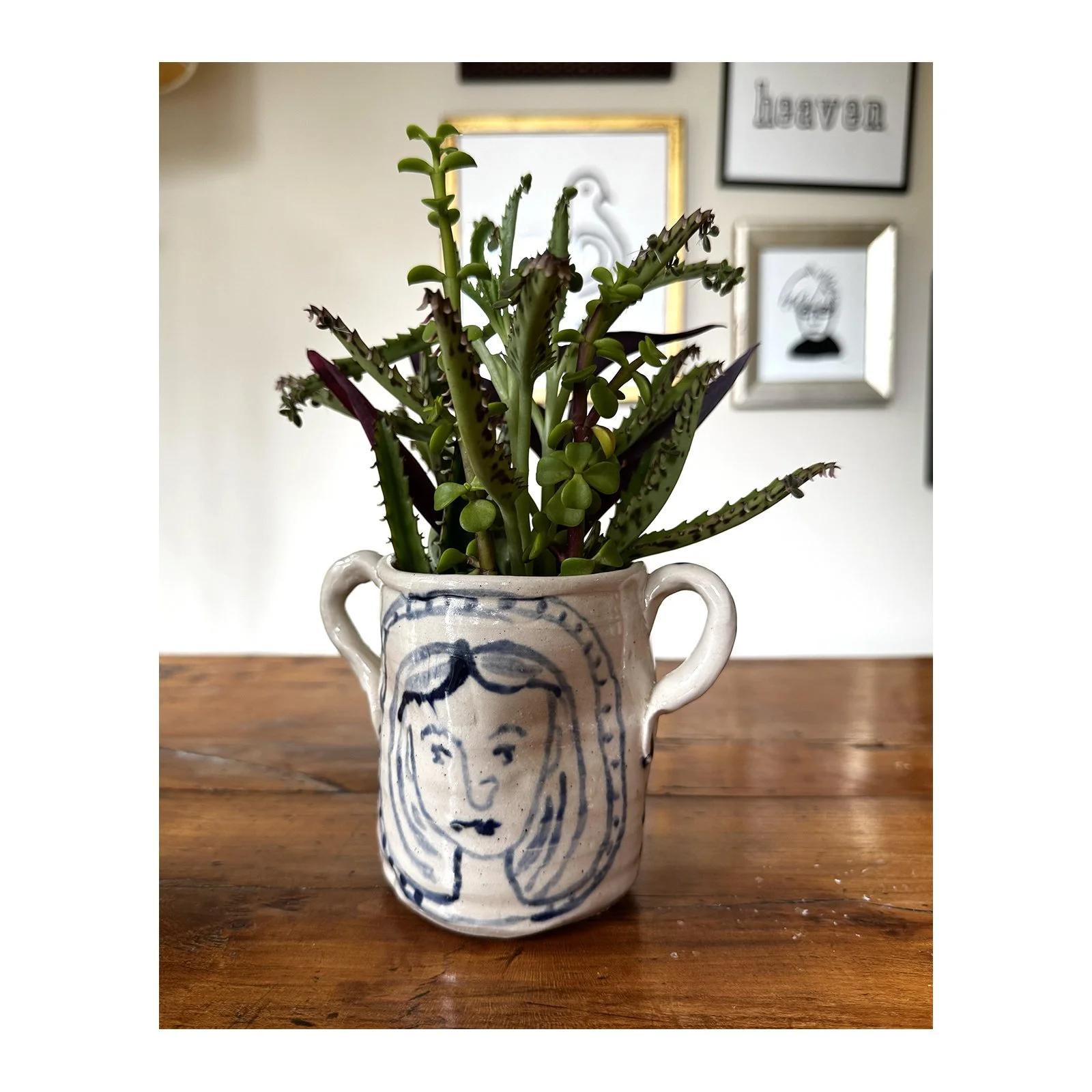 Decorated stoneware cup with two handles with clear glaze by SARAH ODEDINA, 2025