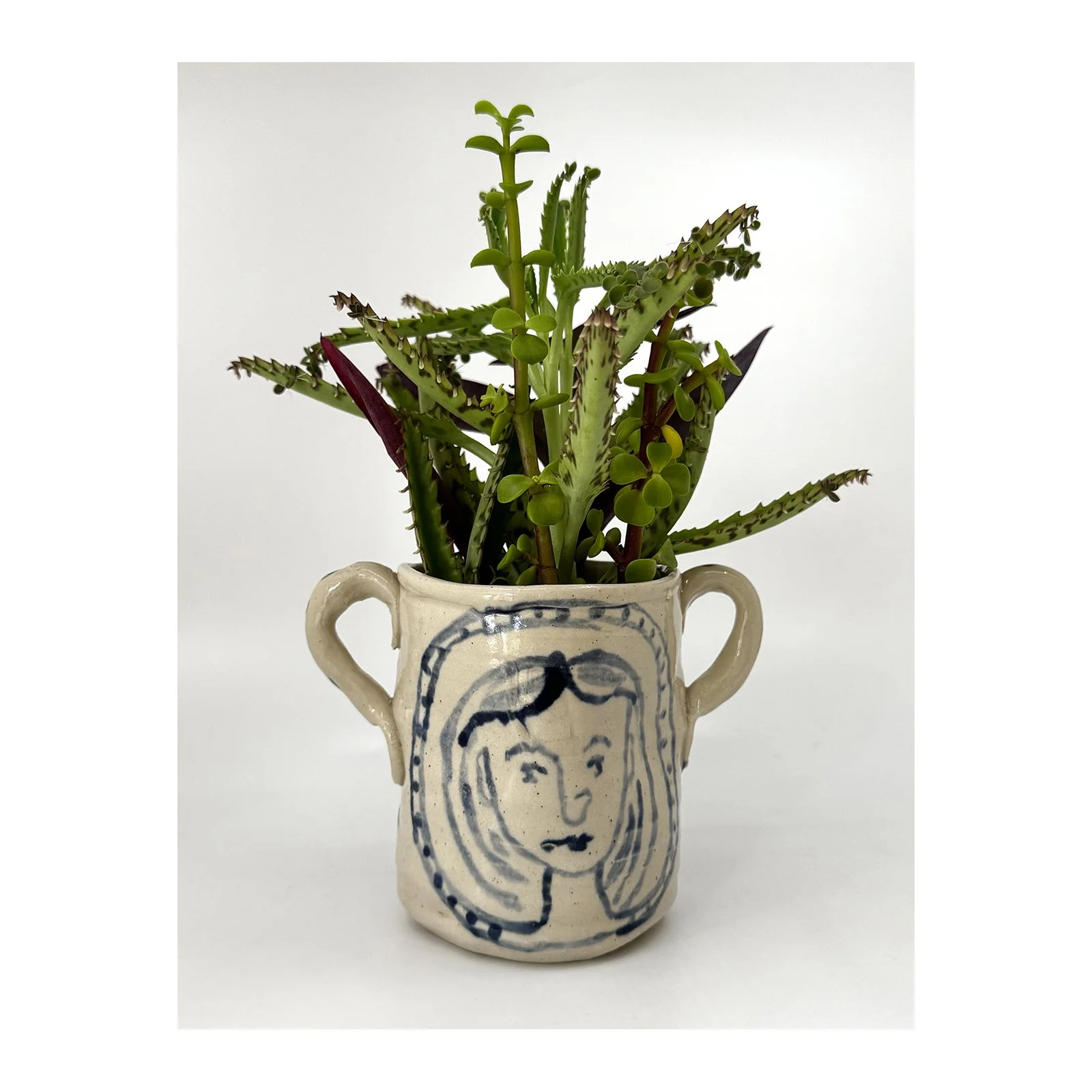 Decorated stoneware cup with two handles with clear glaze by SARAH ODEDINA, 2025