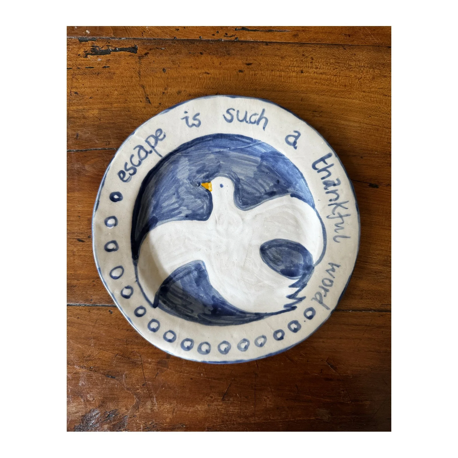 Decorated stoneware plate with clear glaze by SARAH ODEDINA, 2025