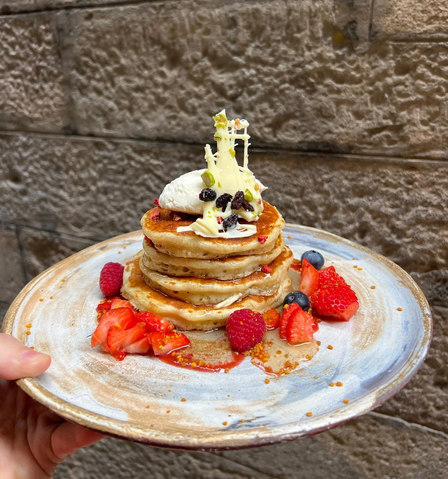 The new pancakes &amp; new salad are here!!
Pancakes with fresh berries &amp; freeze dried strawberries, a white chocolate, cranberry &amp; pistachio bark with strawberry coulis, chantilly &amp; locally farmed honey. 
Broccoli tahini &amp; ginger sal