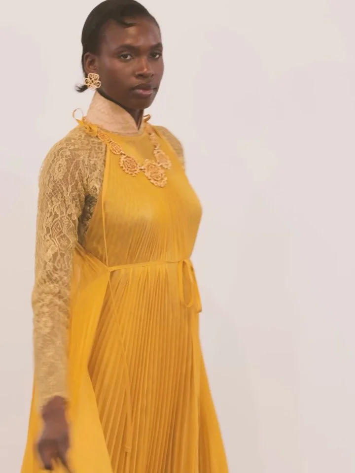 Liquid Gold. Timeless Form.

The &aacute;o d&agrave;i is not confined to tradition&mdash; it evolves, transforms, and arrives wherever elegance is required. 

This look is a study in movement and restraint.  A monochromatic meditation in gold&mdash;w