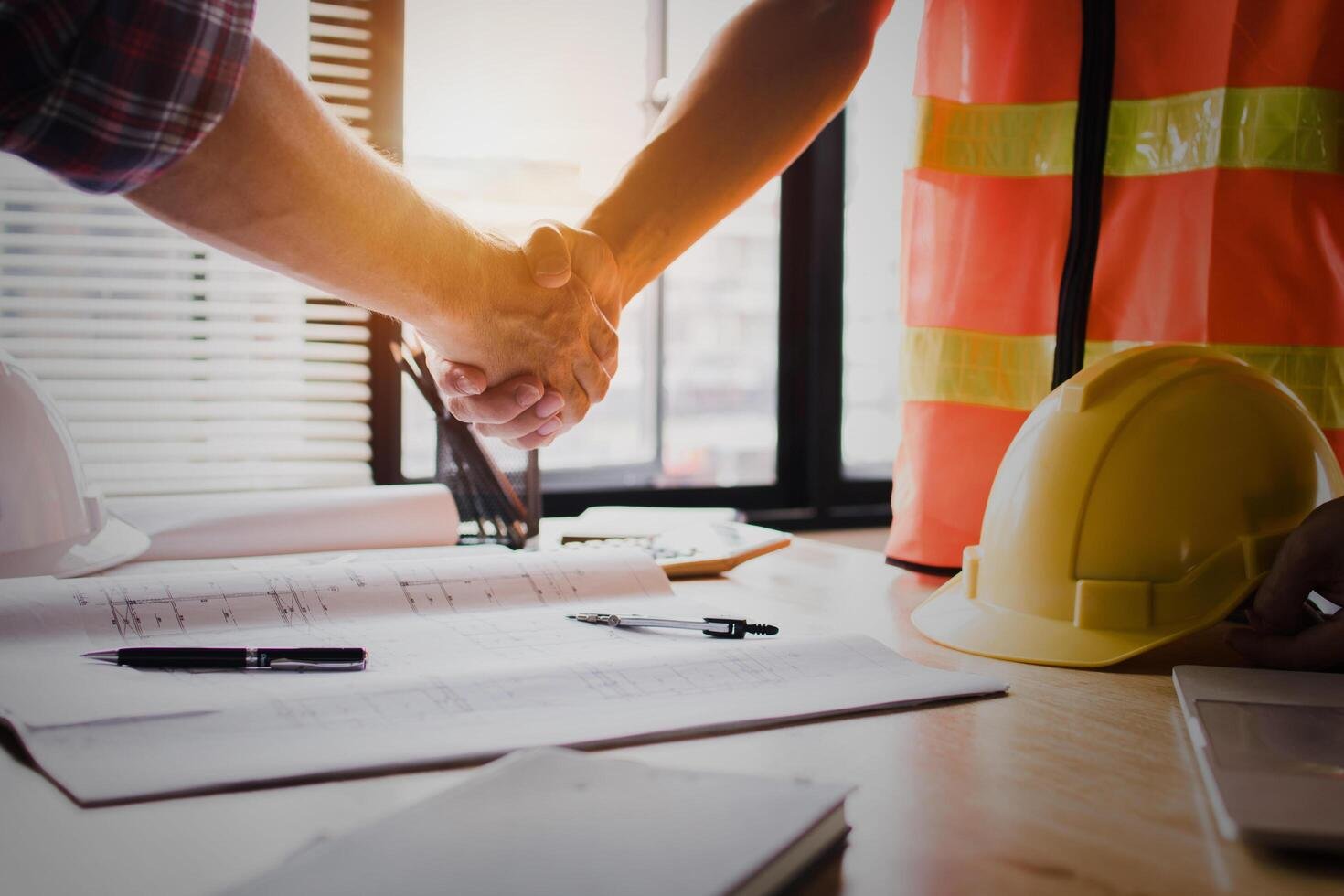 construction-worker-shaking-hands-free-photo.jpg