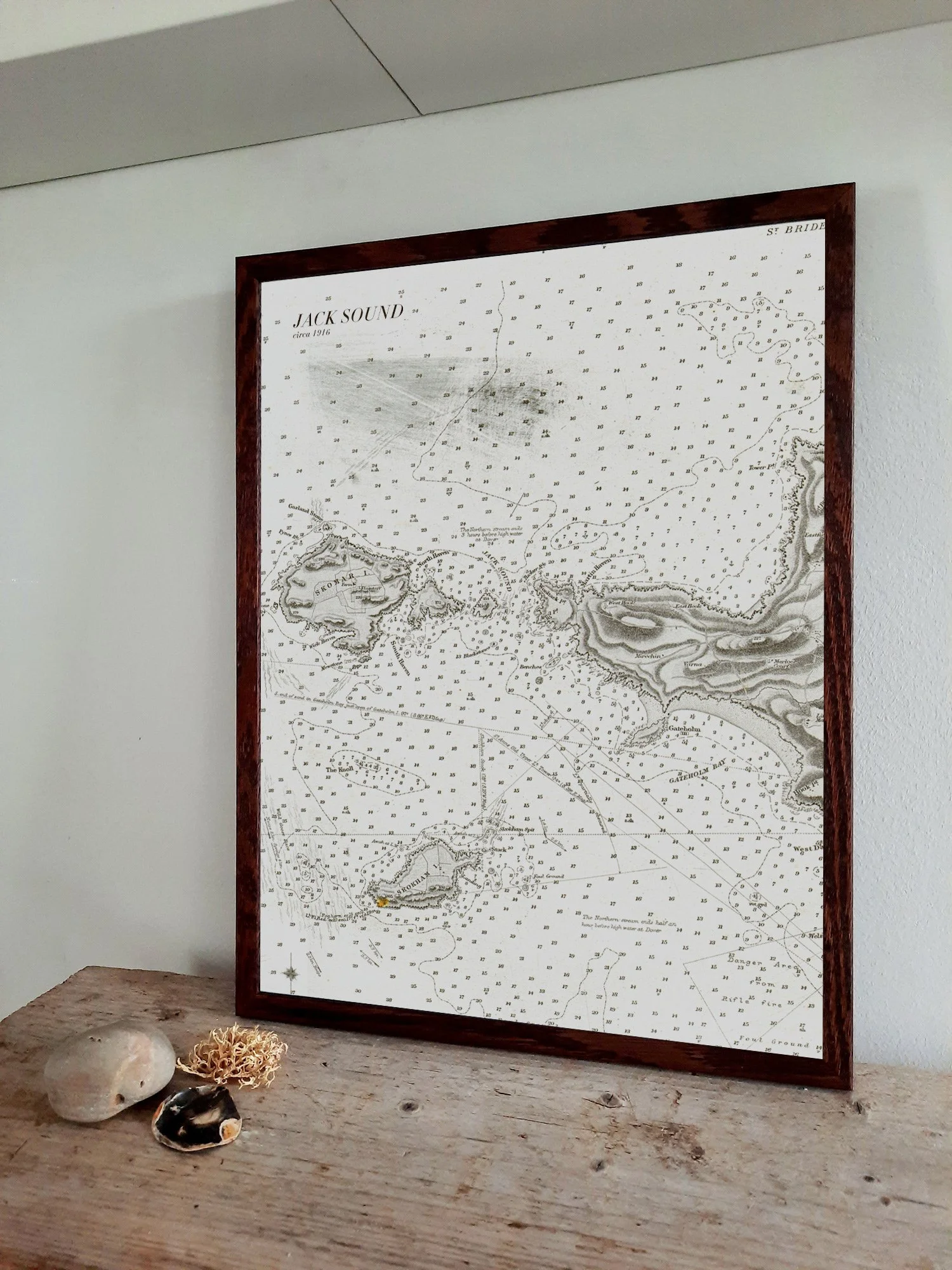 Print from a 1916 nautical chart covering Jack Sound in Pembrokeshire shown framed.