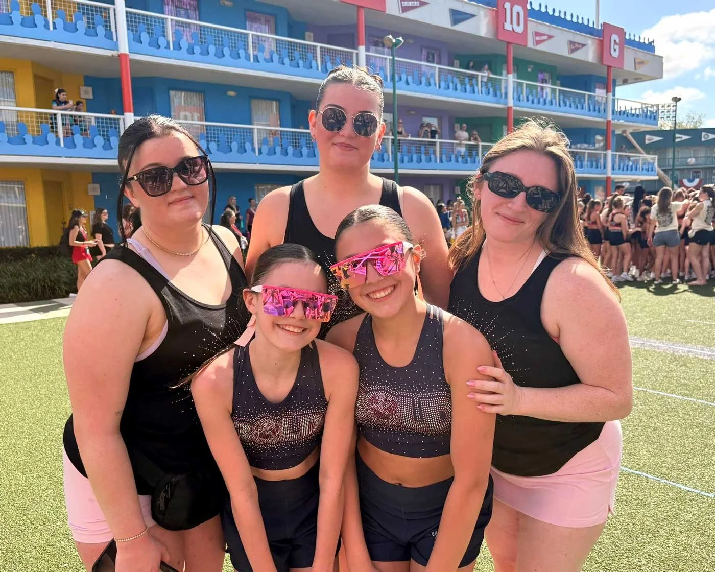 Cheerleaders with their coaches