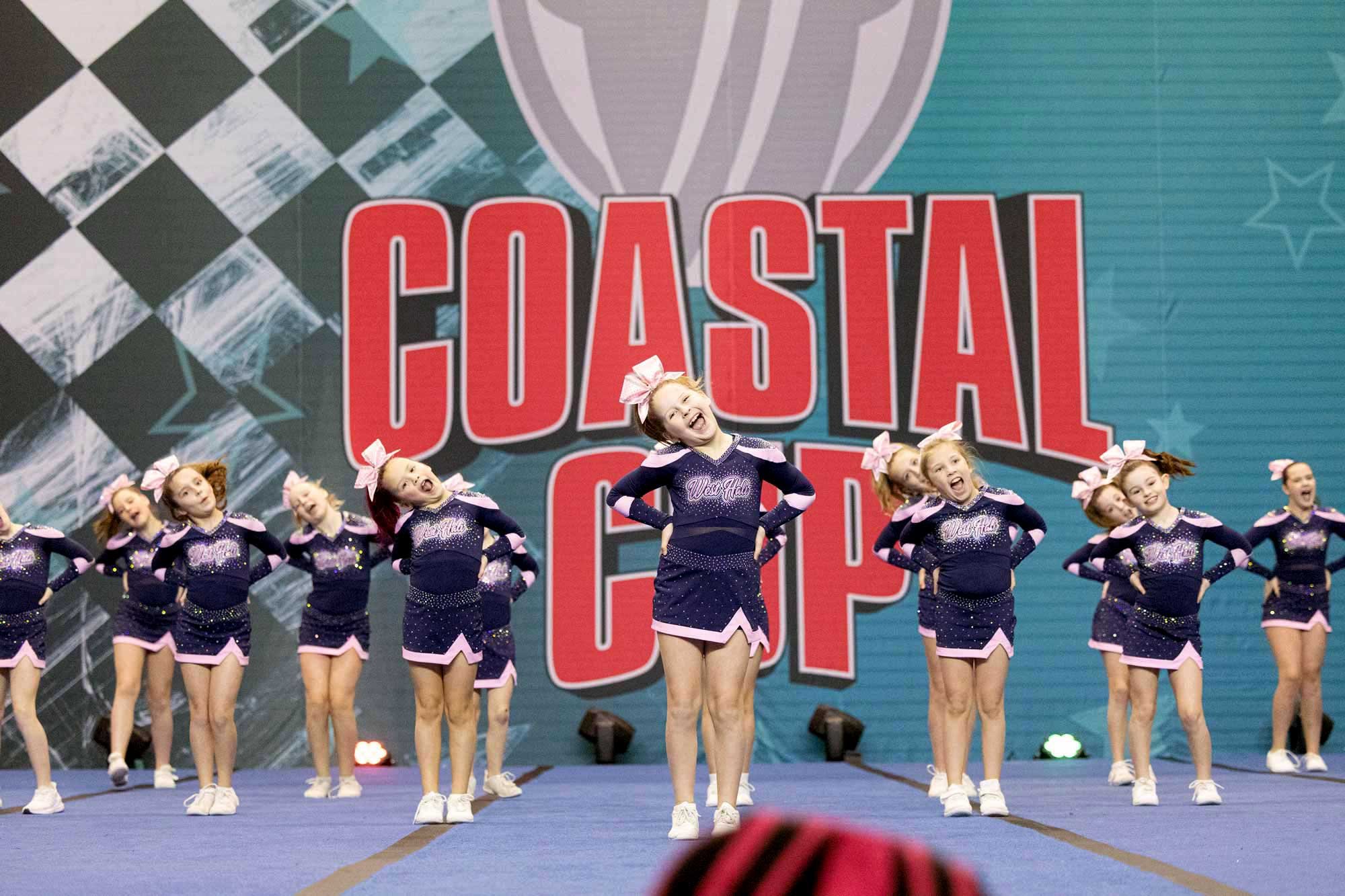 Cheerleaders in formation at Coastal Cup