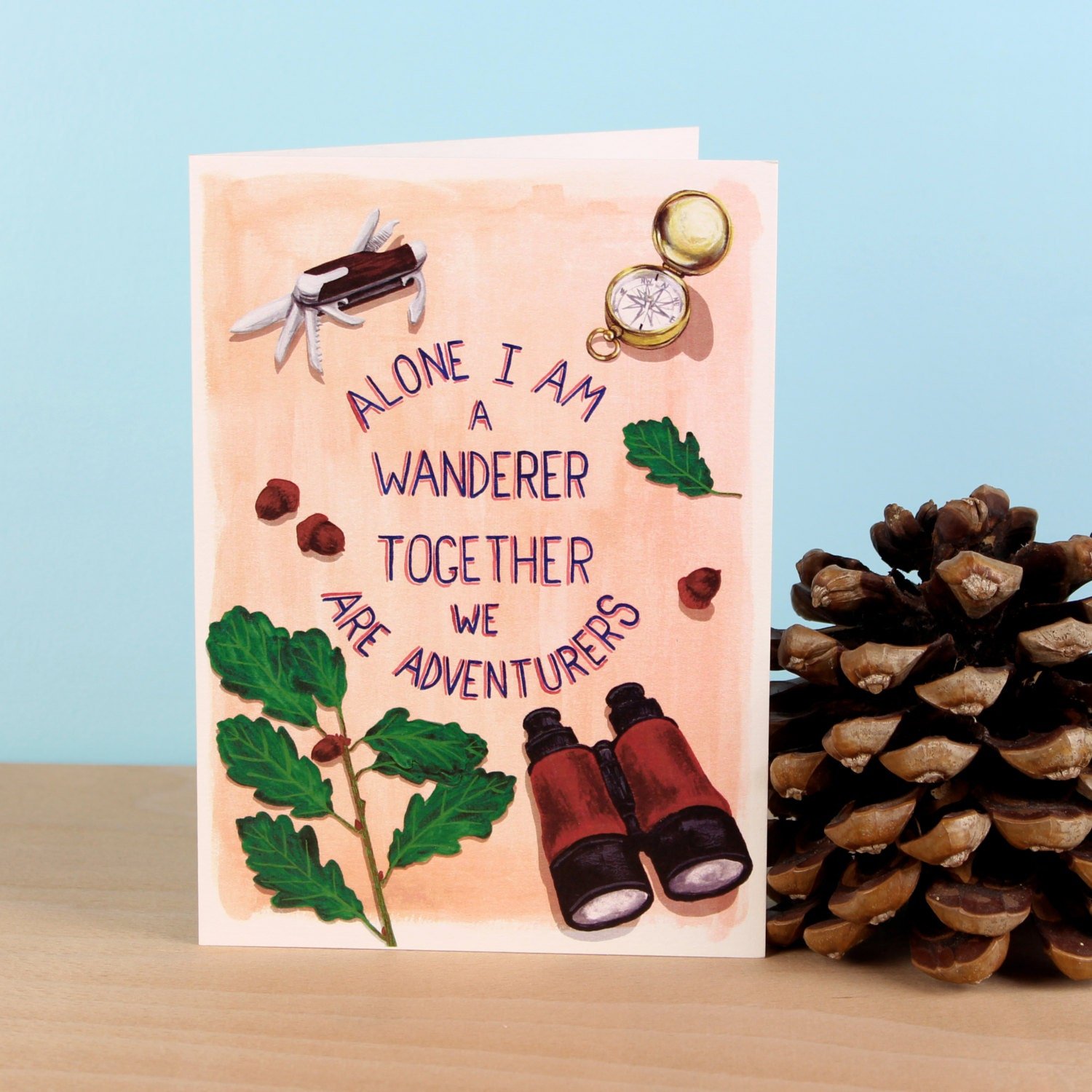 Sweet valentines day card with message "Alone I Am A Wanderer, Together We Are Adventurers" with scout kit illustrations
