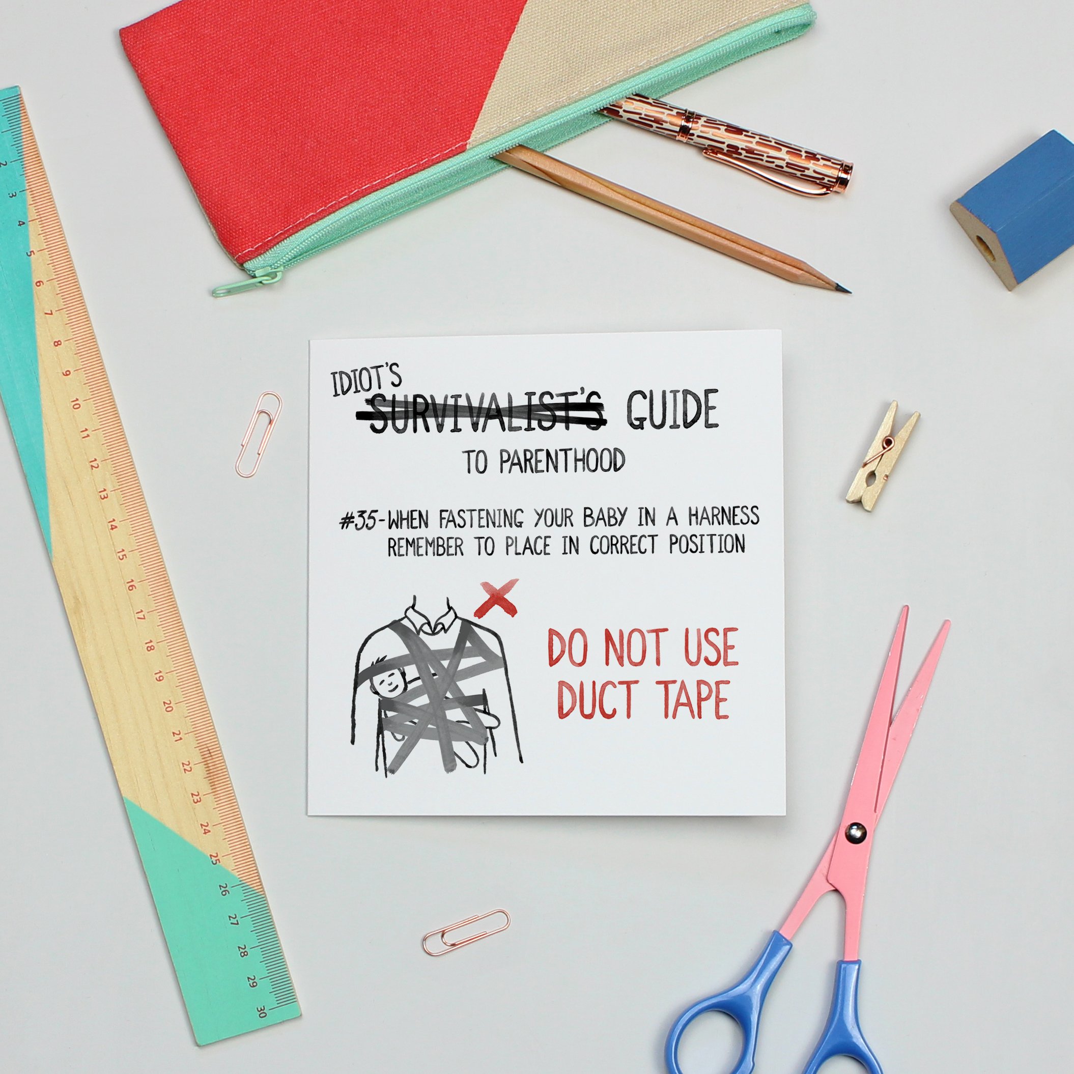 Humorous greetings card for new parents with an Idiot's Guide To Parenthood with the most obvious advice