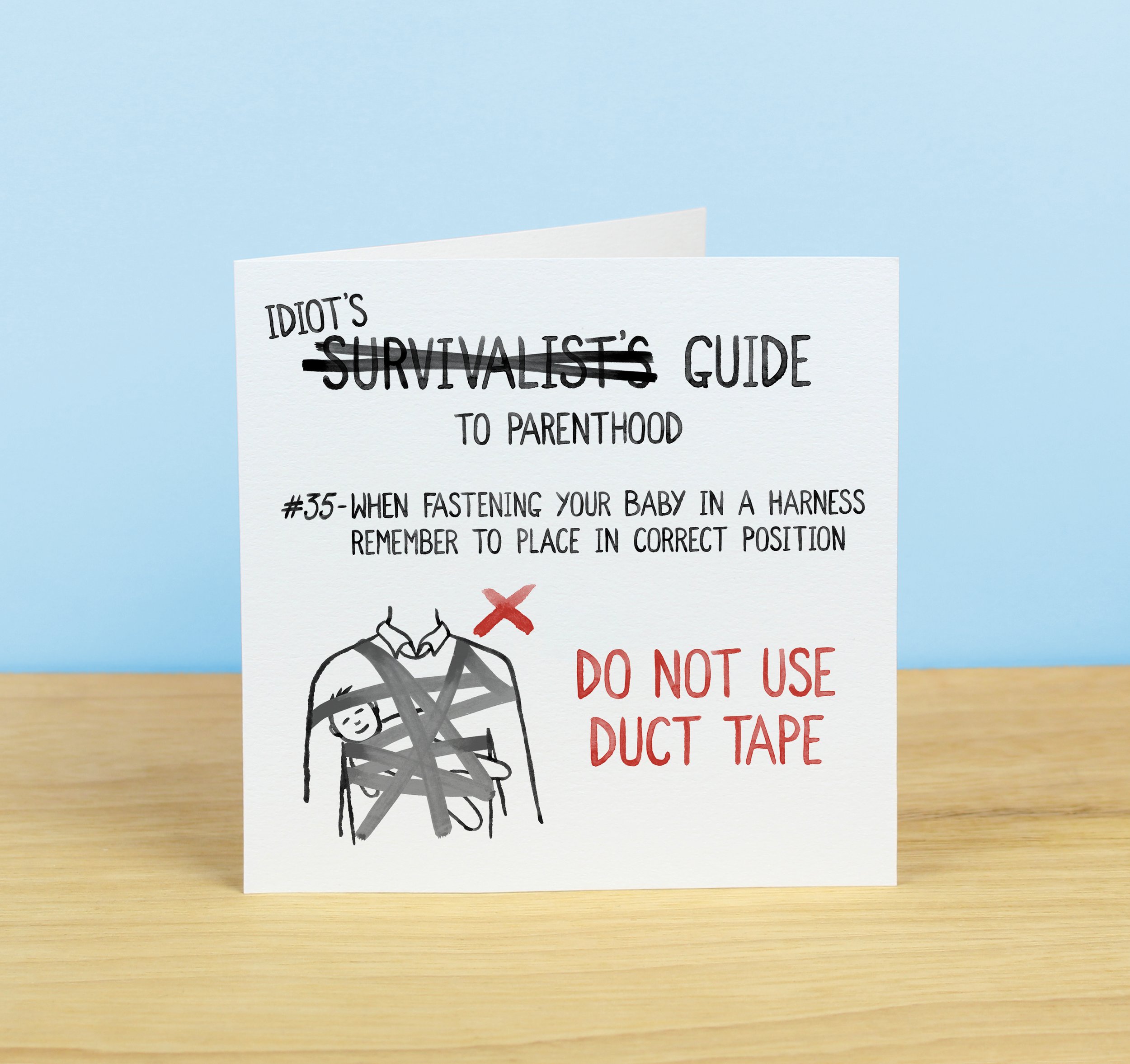 Idiot Guide to Parenthood greetings card for new parents with humorously obvious advice
