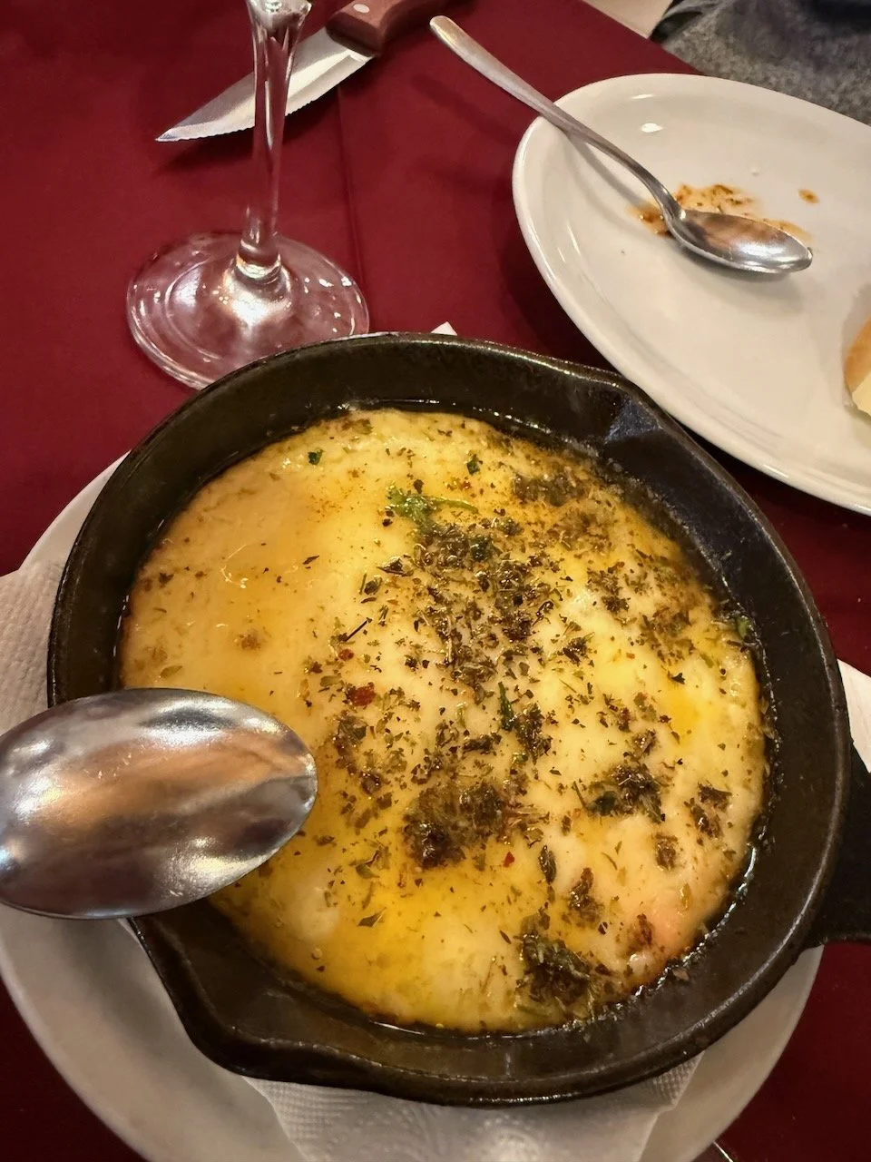 We couldn't resist ordering provoleta one last time. It's an Argentine appetizer made with of griddled cheese, usually provolone, and topped with chimichurri