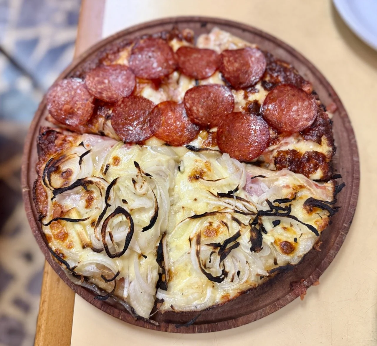 Pizzería Güerrín, traditional Argentinian-style pizza & empanadas, open since 1932. We went for a 1/2 classic pepperoni and 1/2 onions and cheese. Even though the onions were mild it was a bit rich/strong for more than one slice. 