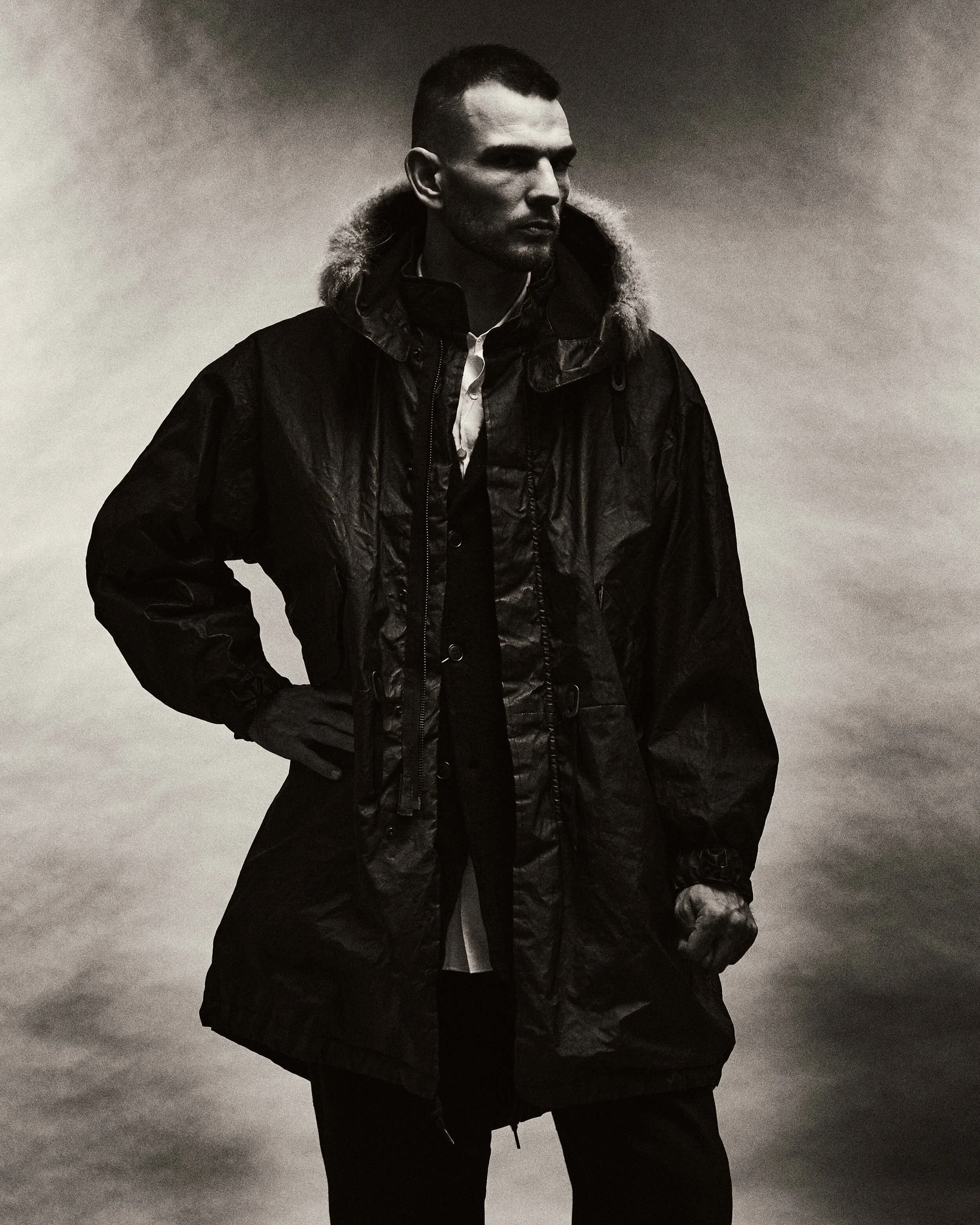 NL_Untitled Catalog0569 014916 COMOLI PAPER LEATHER MILITARY HOODED COAT C03-04007 Black 33575 DKK | Photo by Philip Vind Thomsen : MODERN-DAY architect.jpg