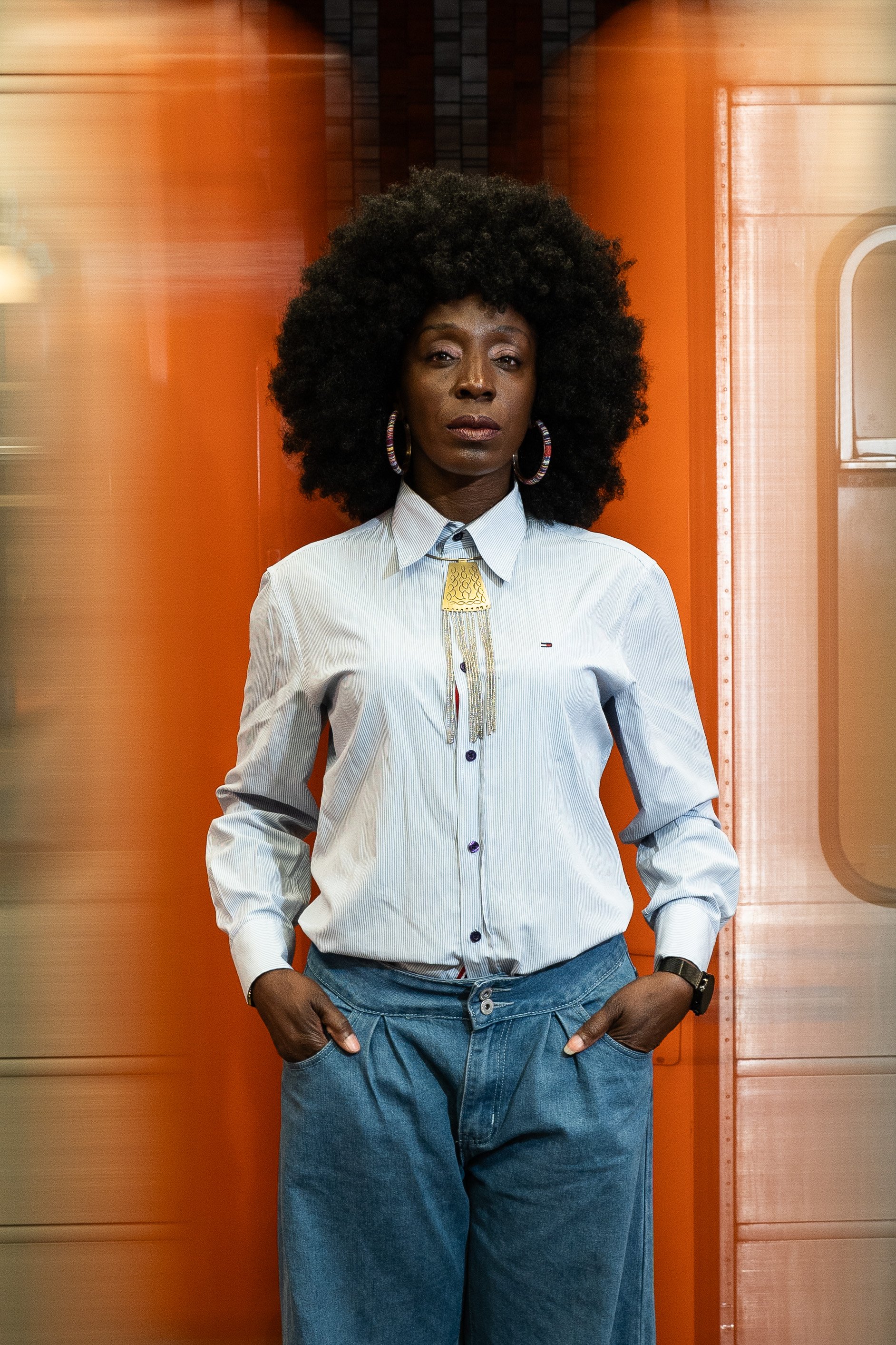 portrait of afro women with metro in backround