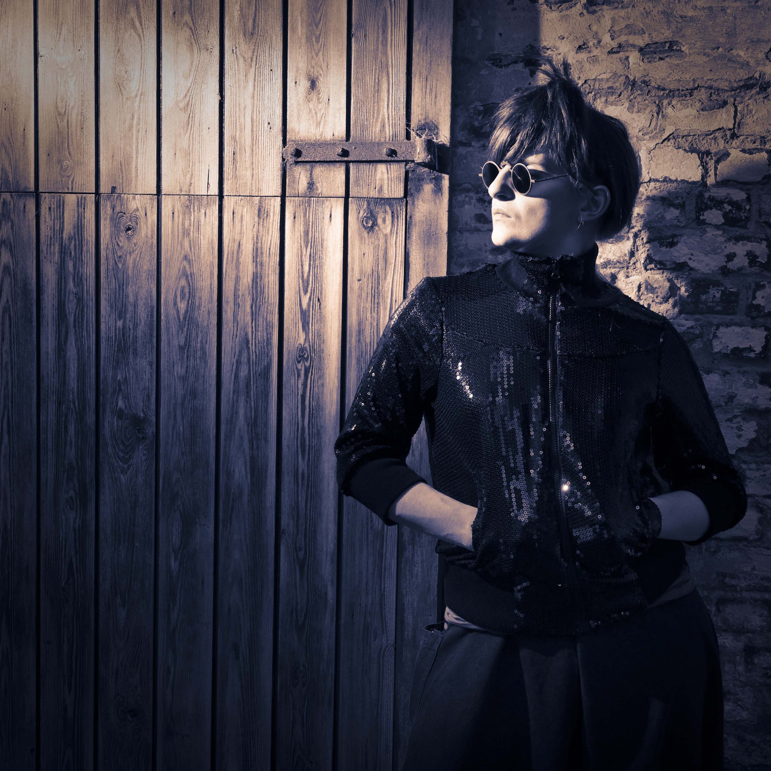 dramatic portrait of women wearing sun glaces