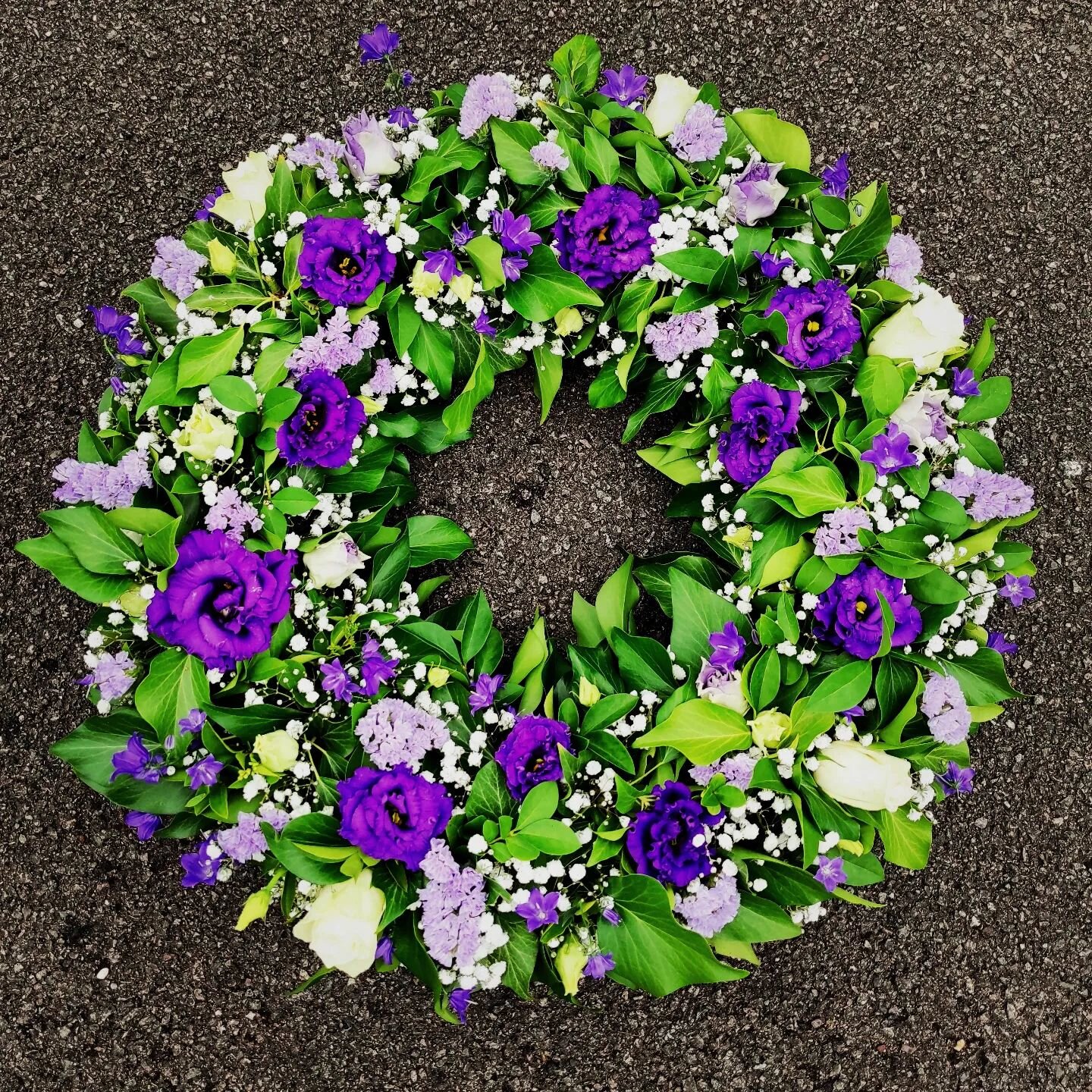 Purple and white seasonal wreath

#thefuneralflorist #shopstamford #peterboroughfuneralflowers #stamfordflorist #stamfordfuneral #oakhamflorist #peterborough