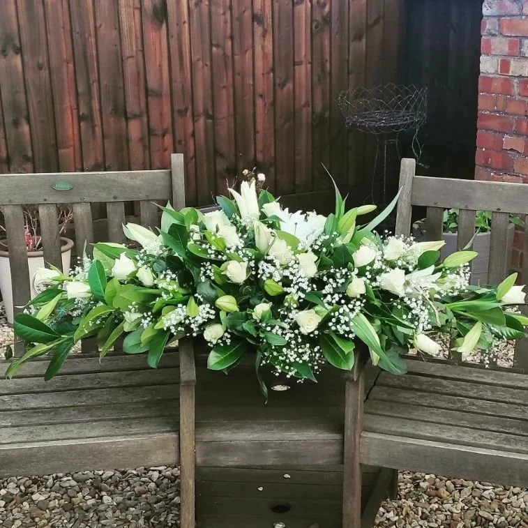 The Funeral Florist - White Casket Spray flowers.jpg