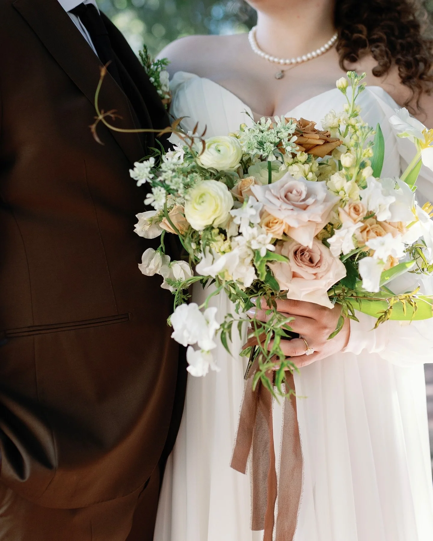 A day to remember! I love it when couples are open to ideas &amp; incorporate the tiniest but meaningful details. The bridesmaids carry mono-type flower posies inspired by the bridal bouquet. Once they put their posies together it completed Michelle&