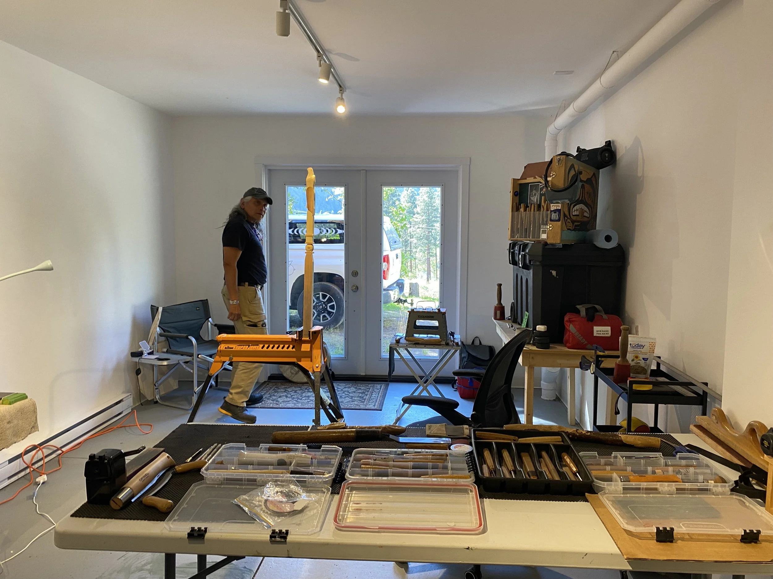 Xwalacktun giving a tour of his studio