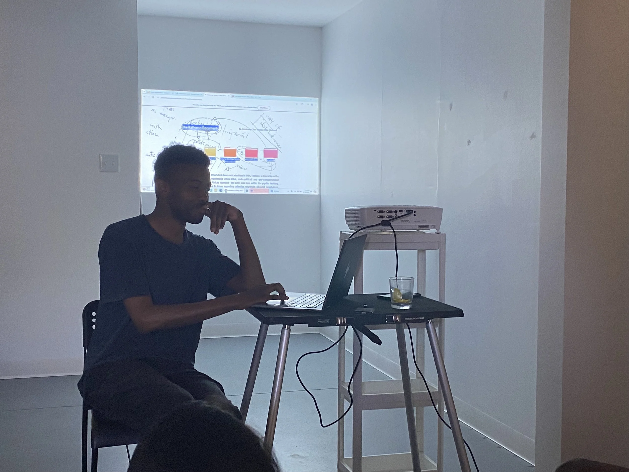 Pebo giving an artist presentation