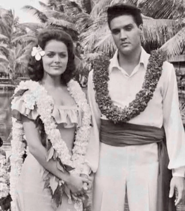 Elvis on the set of Blue Hawaii with Joan Blackman.