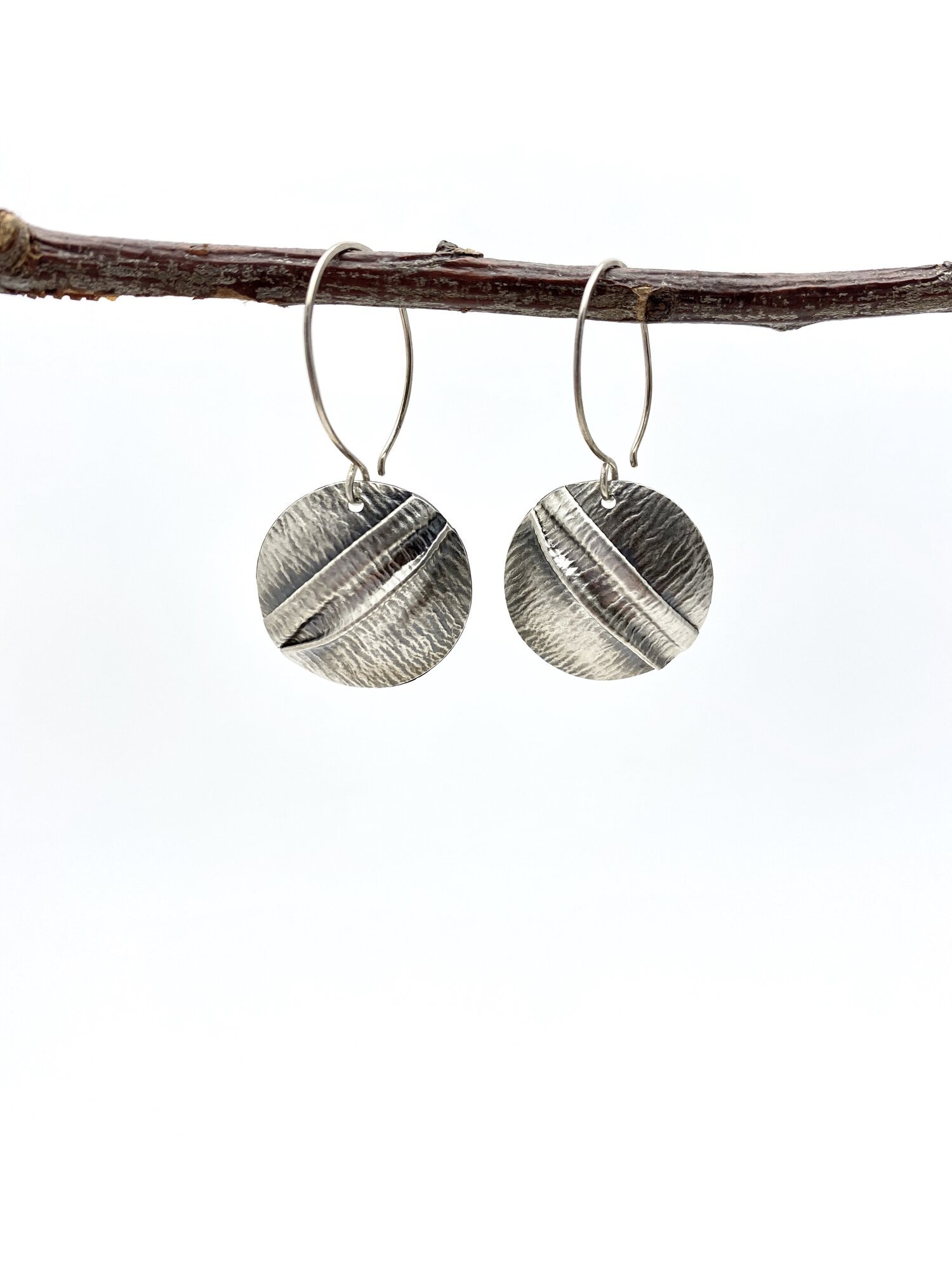 FOLD FORMED SILVER PILLOWS