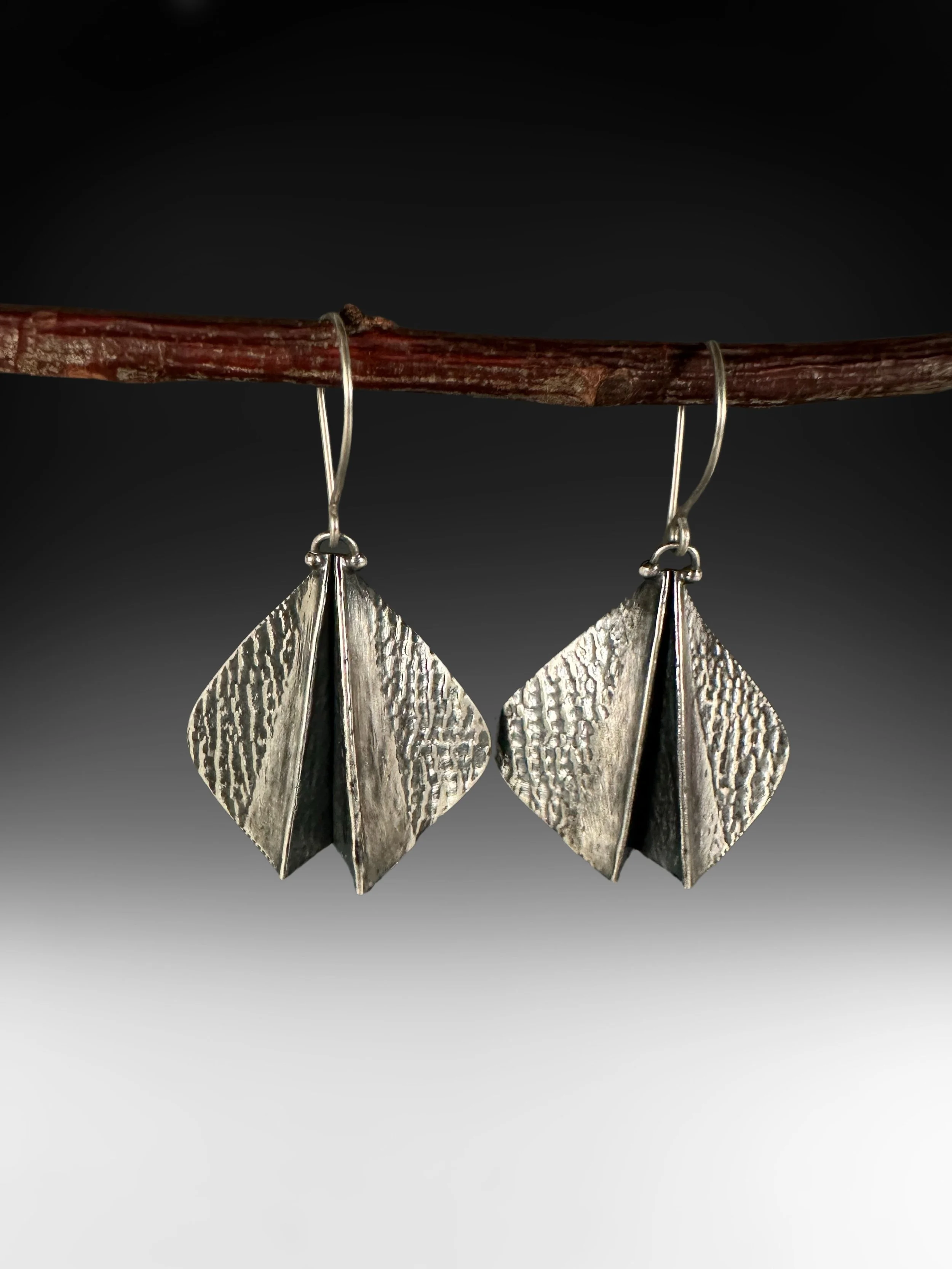 SILVER PLEATED WINGS