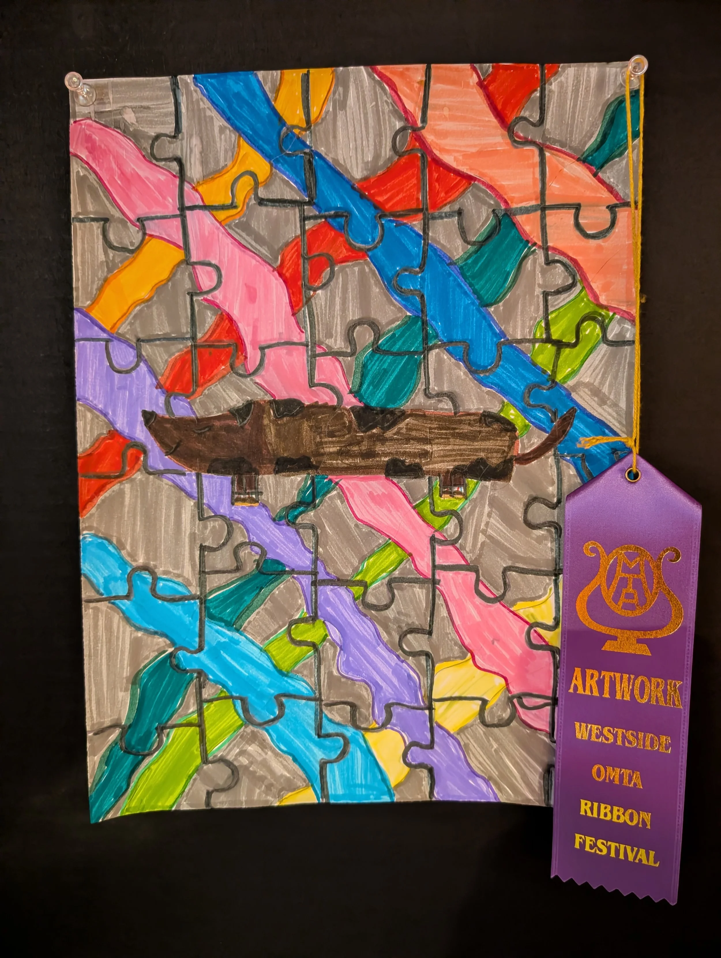 Art piece of a puzzle with a dog.