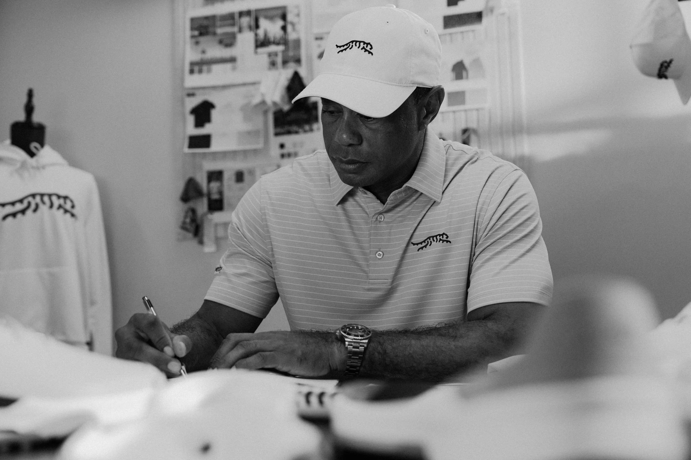 Tiger Woods photographed for a premium golf apparel brand, Sun Day Red, advertising campaign by Los Angeles commercial photographer Garrett Byrum. Golf advertising photographer.