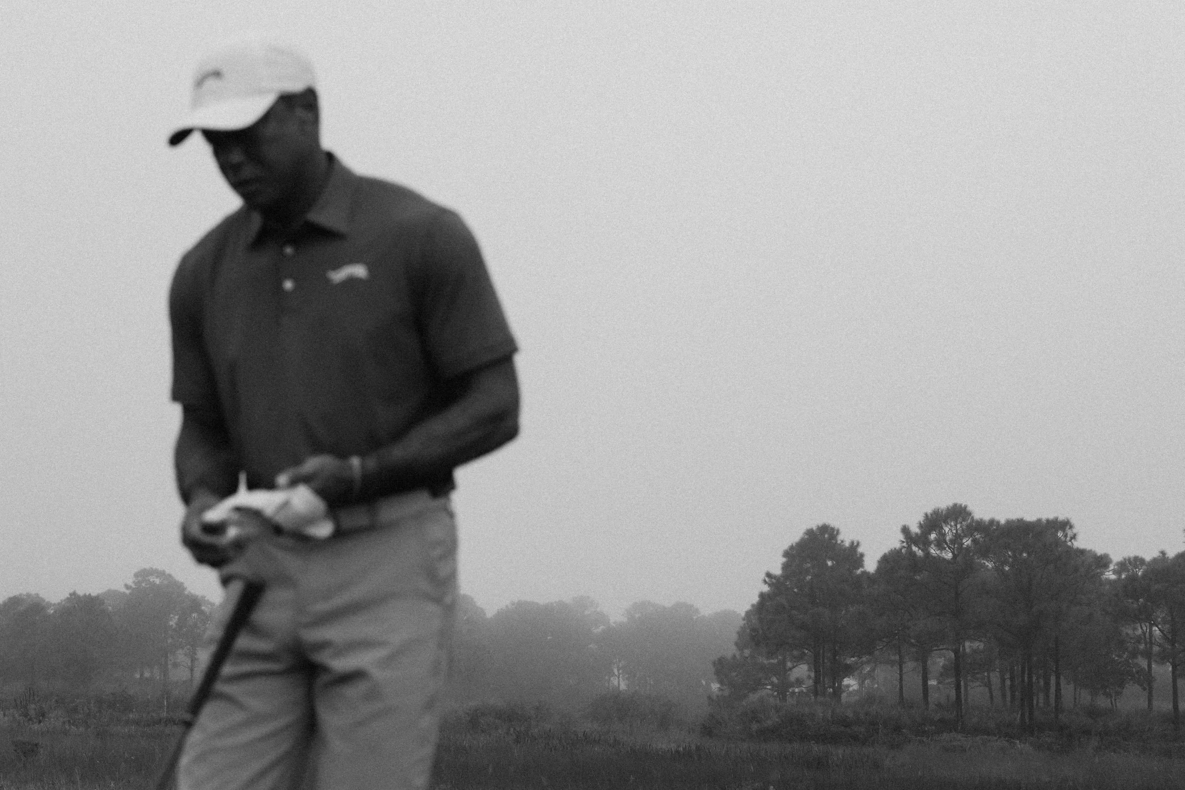 Tiger Woods photographed for a premium golf apparel brand, Sun Day Red, advertising campaign by Los Angeles commercial photographer Garrett Byrum. Golf advertising photographer.