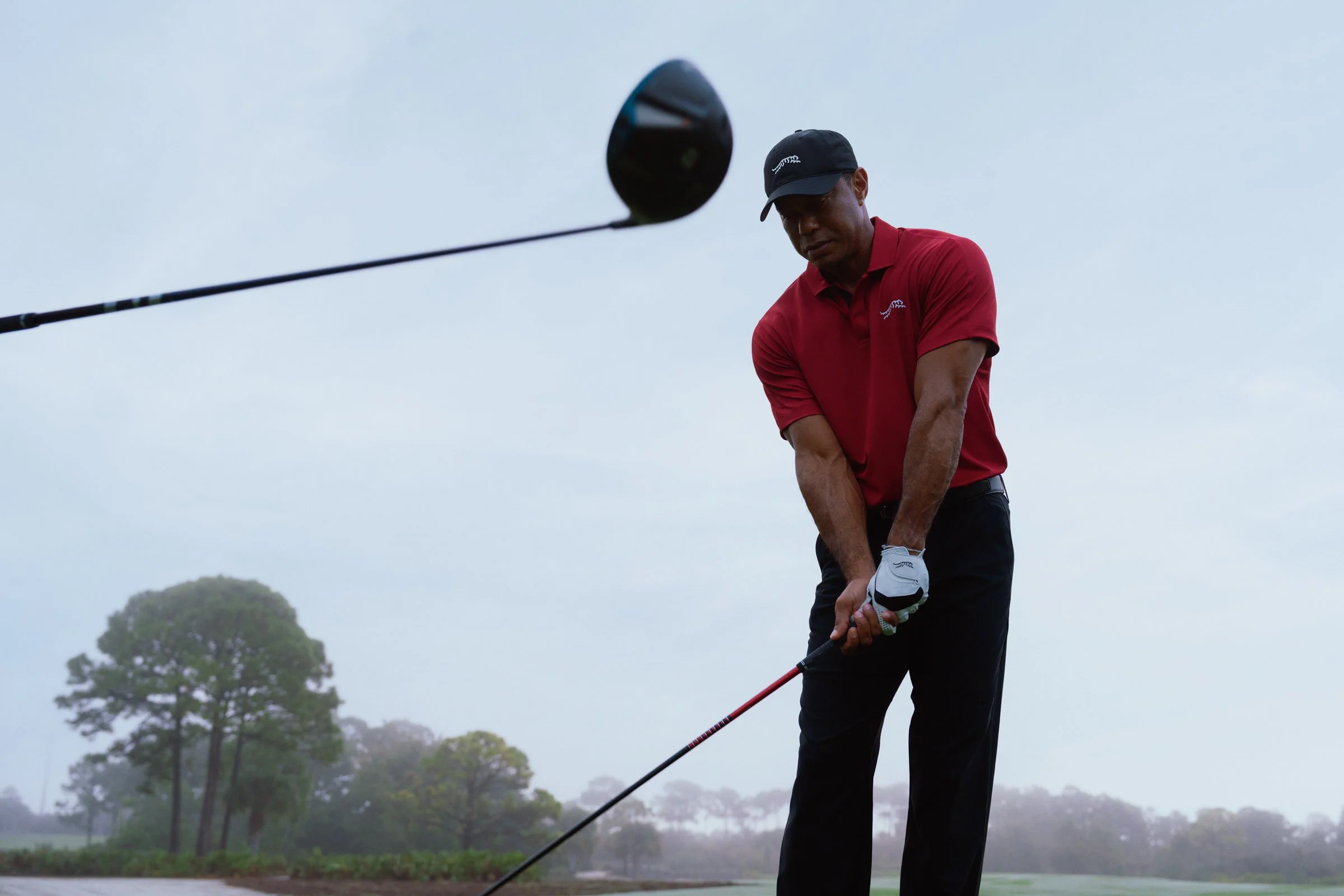 Tiger Woods photographed for a premium golf apparel brand, Sun Day Red, advertising campaign by Los Angeles commercial photographer Garrett Byrum. Golf advertising photographer.