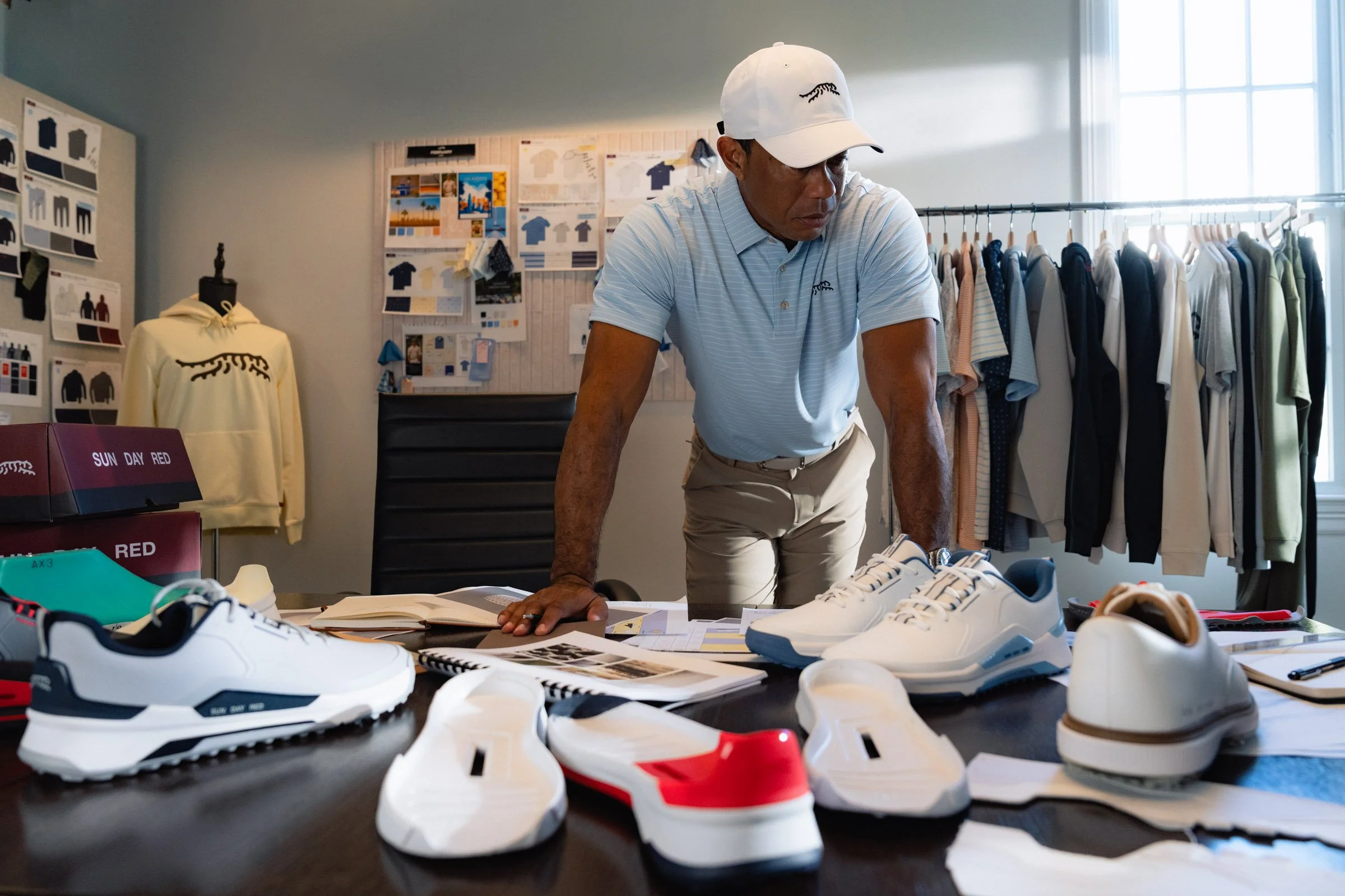 Tiger Woods photographed for a premium golf apparel brand, Sun Day Red, advertising campaign by Los Angeles commercial photographer Garrett Byrum. Golf advertising photographer.
