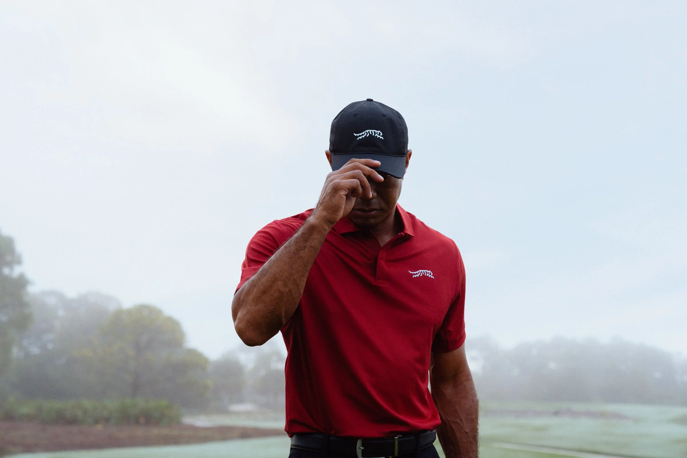 Tiger Woods photographed for a premium golf apparel brand, Sun Day Red, advertising campaign by Los Angeles commercial photographer Garrett Byrum. Golf advertising photographer.