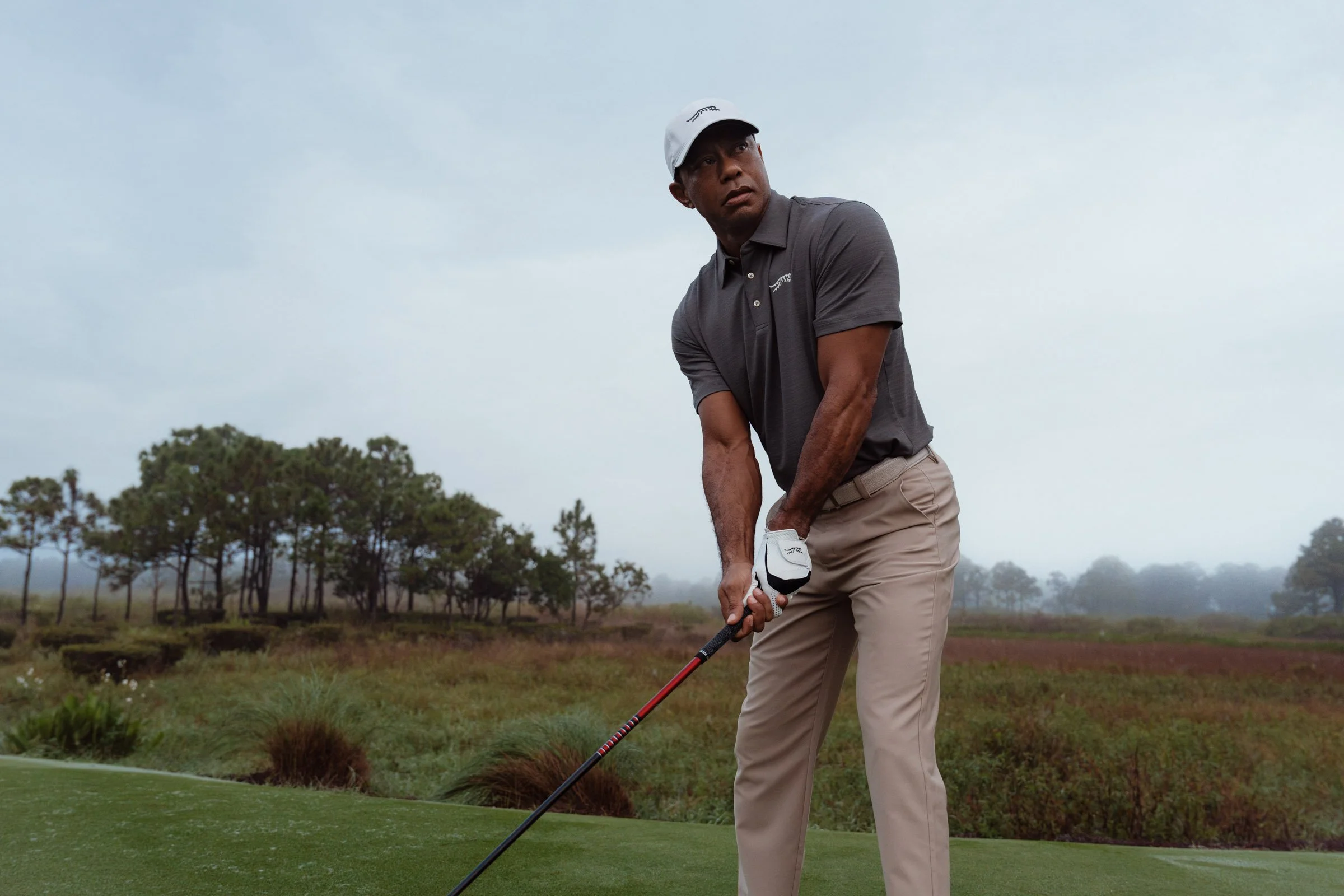 Tiger Woods photographed for a premium golf apparel brand, Sun Day Red, advertising campaign by Los Angeles commercial photographer Garrett Byrum. Golf advertising photographer.